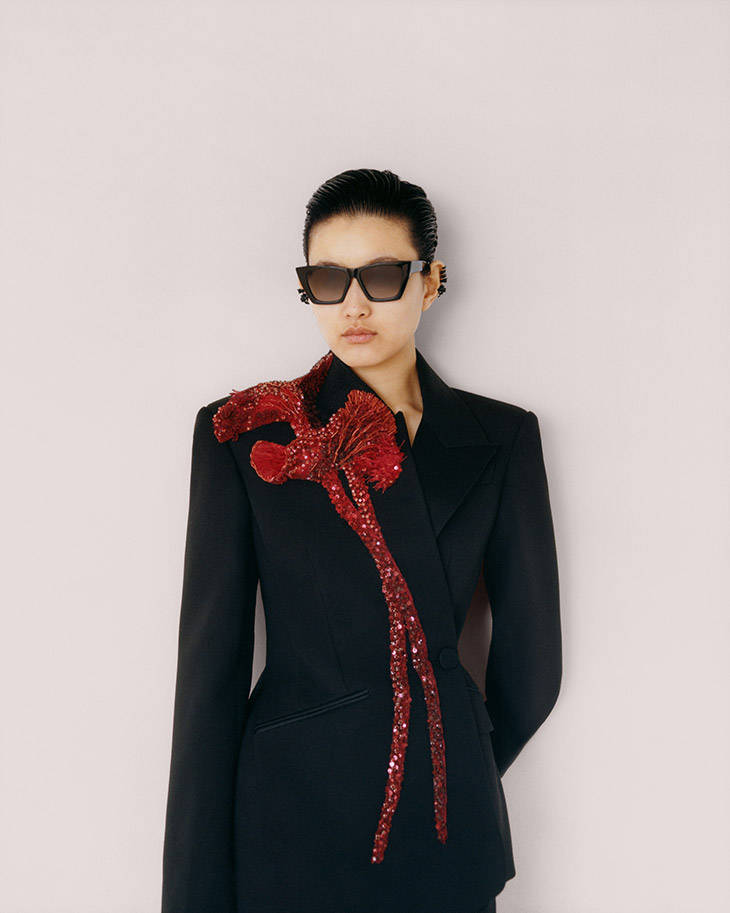 Alexander Mcqueen Coat Model Black Red Background