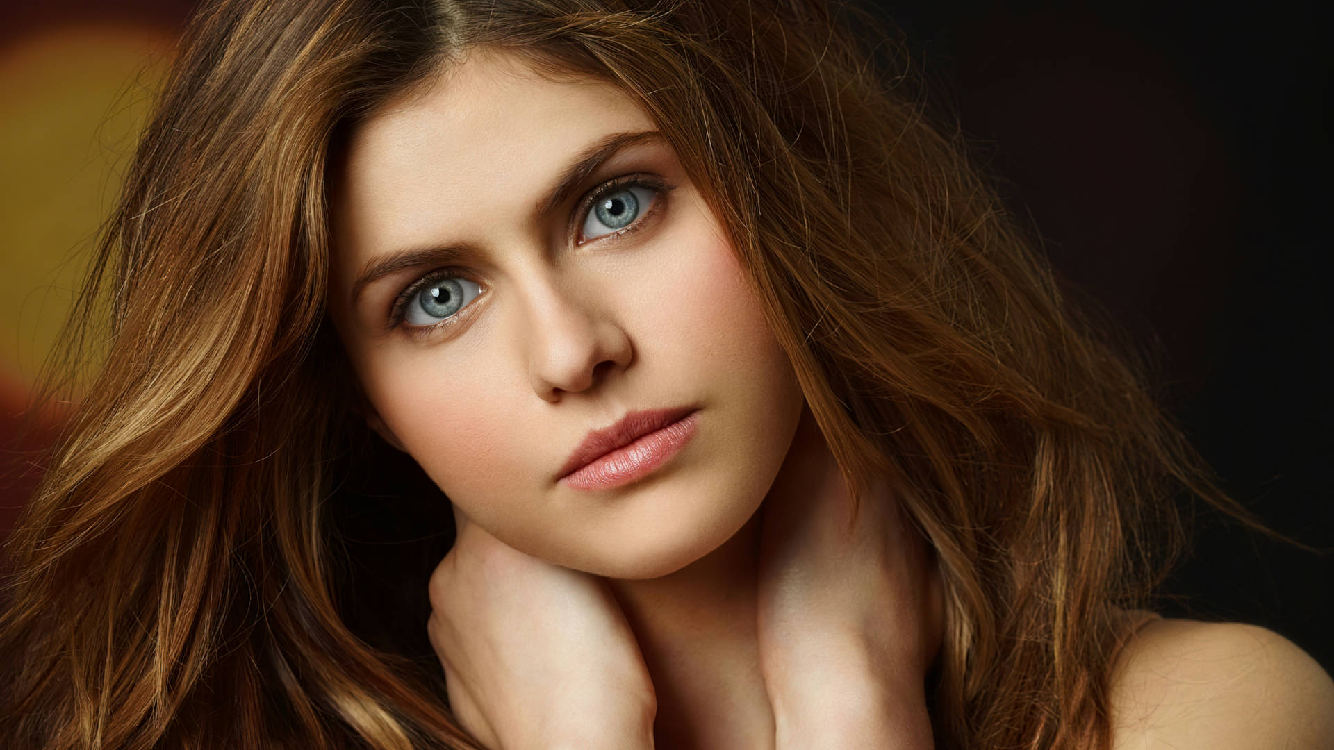 Alexandra Daddario Looking Confident And Alluring Background