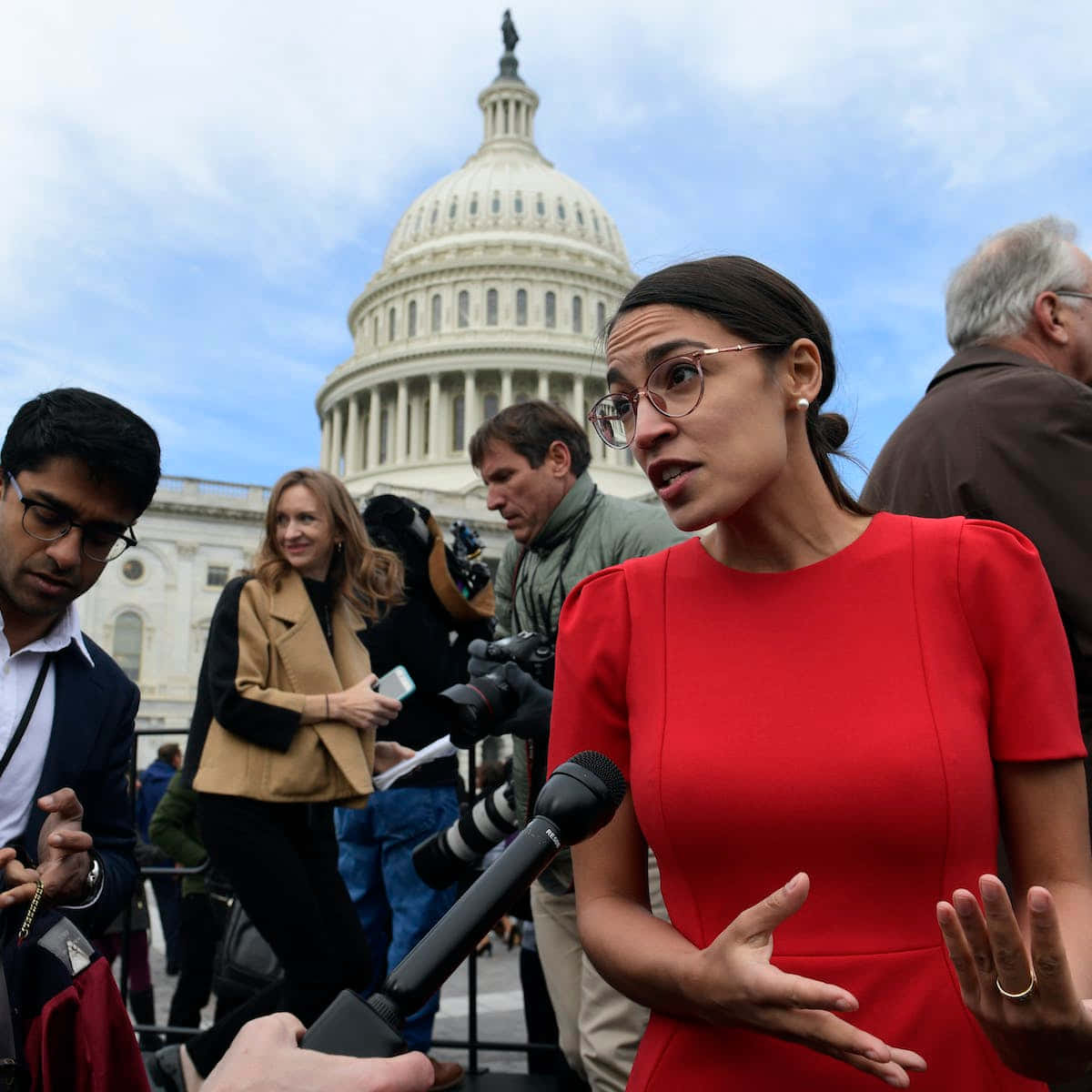 Alexandria Ocasio-cortez During An Interview Background
