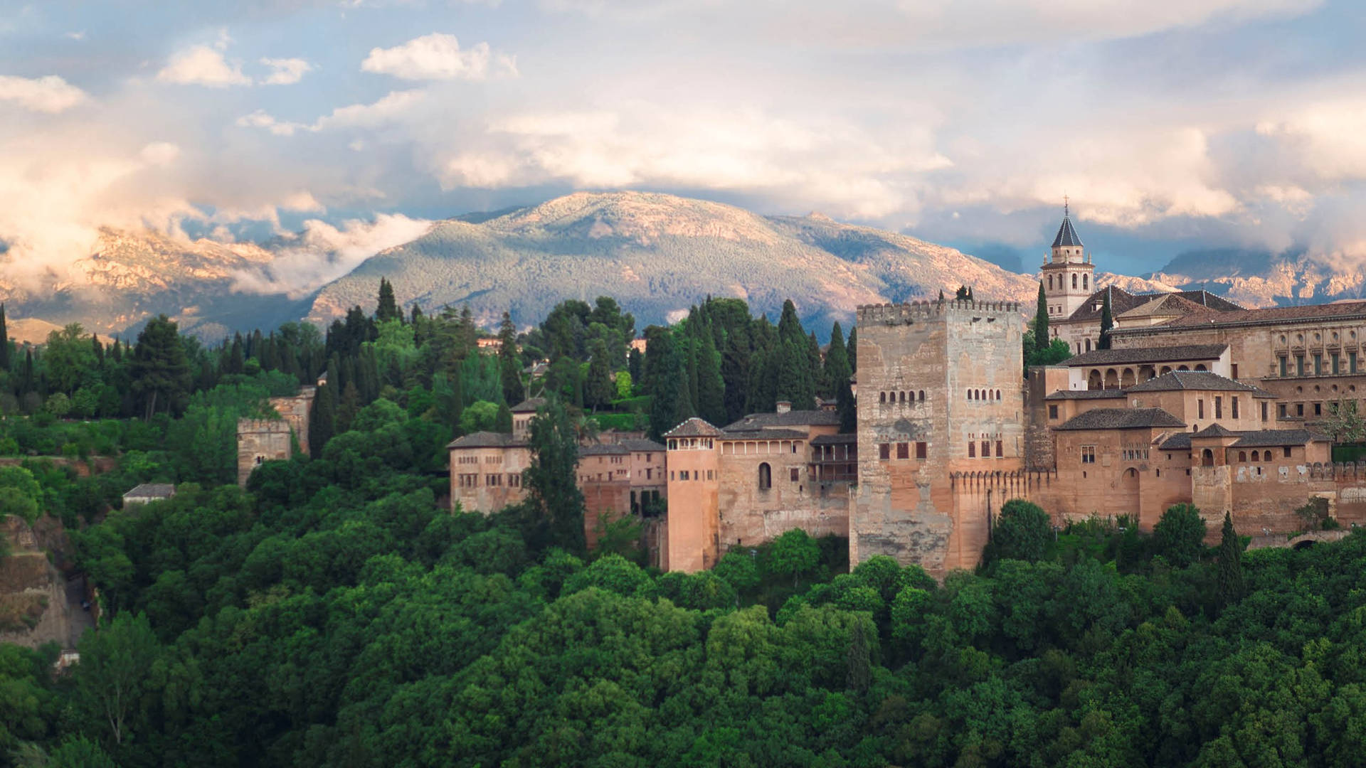 Alhambra Surrounded By Trees Background