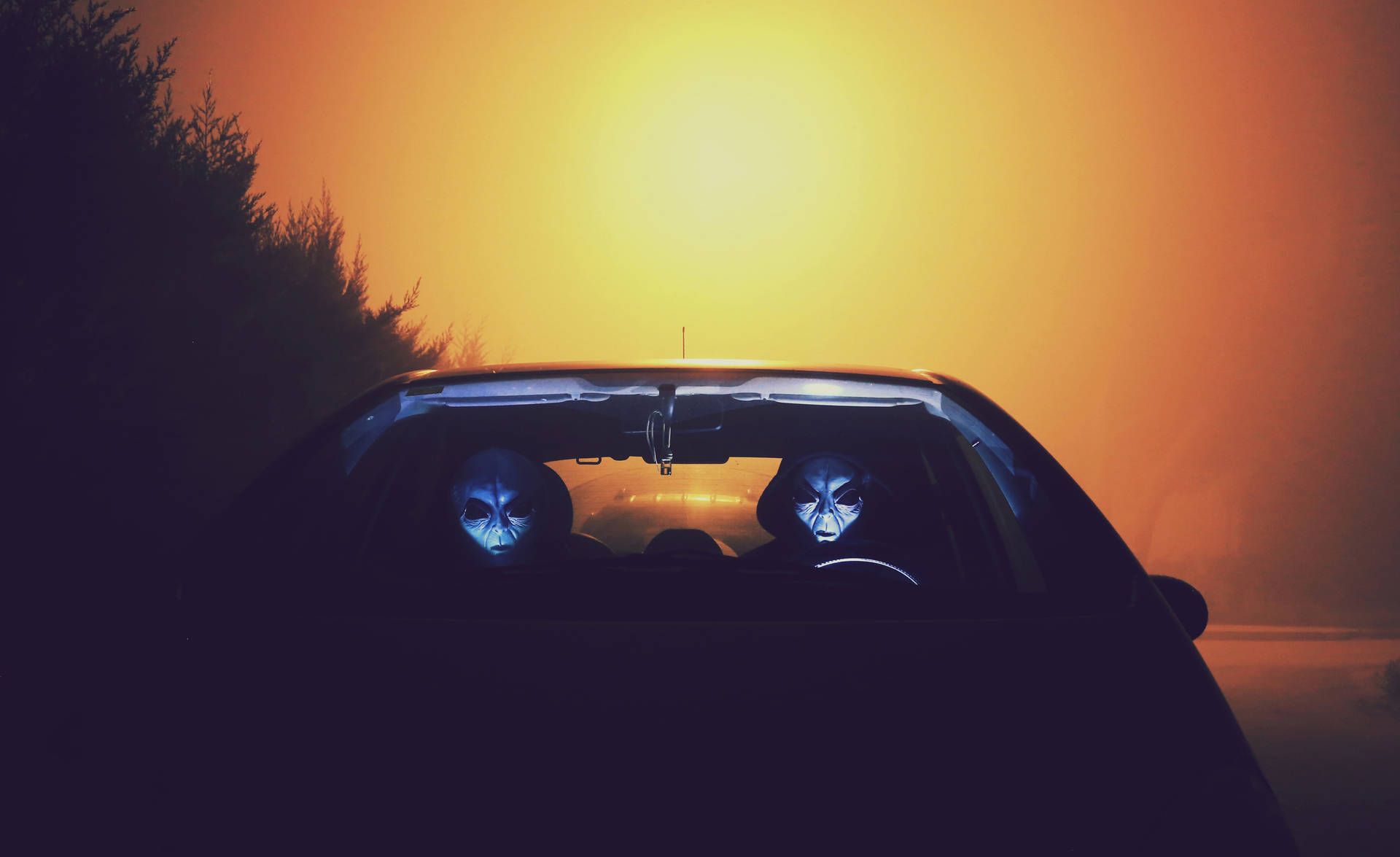 Alien Riding A Car Background