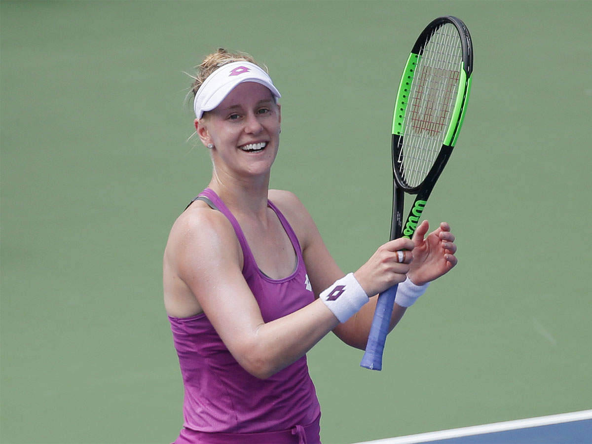 Alison Riske-amritraj Poses With Tennis Racket