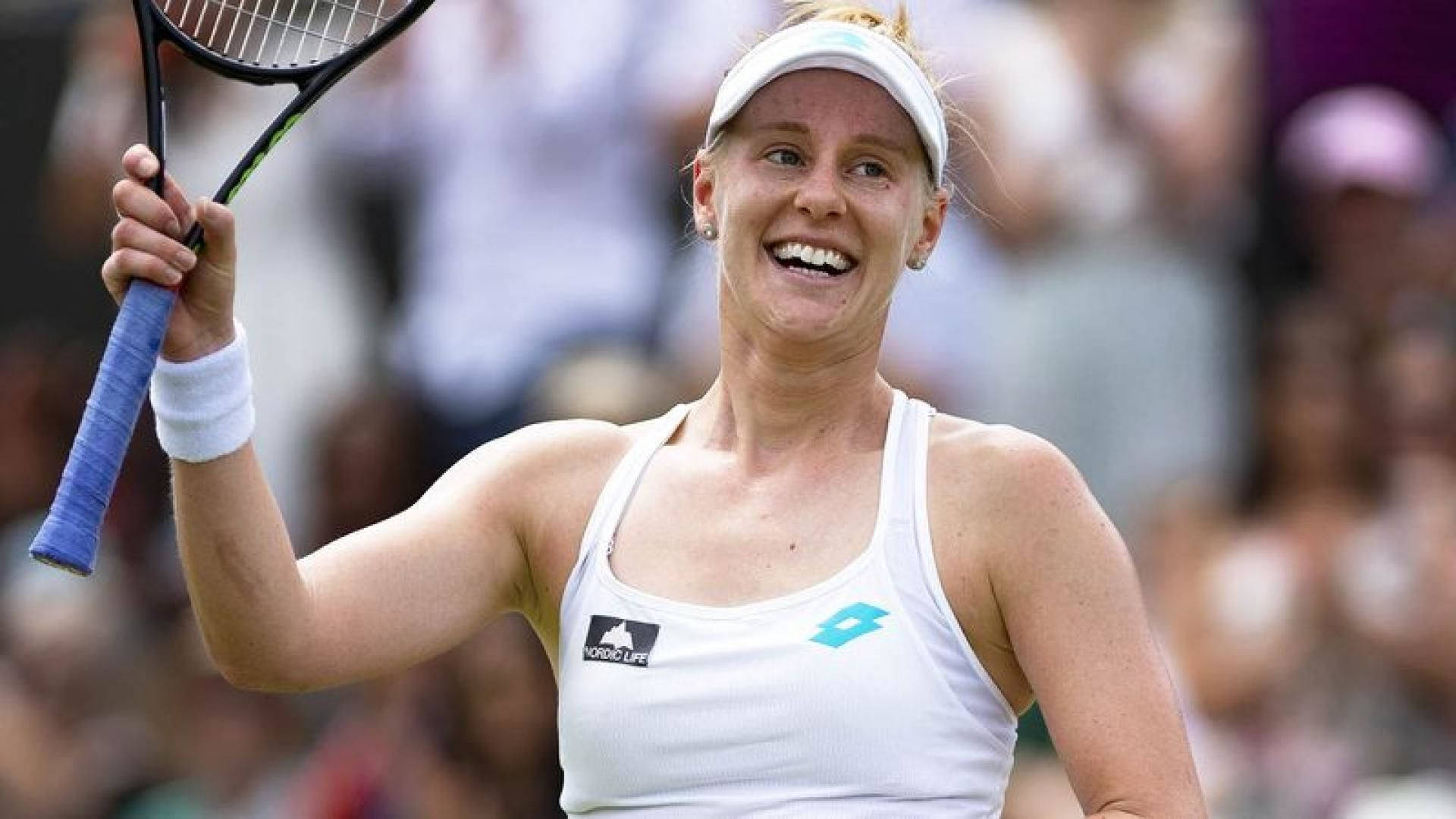 Alison Riske-amritraj Smiling With Raised Racket Background