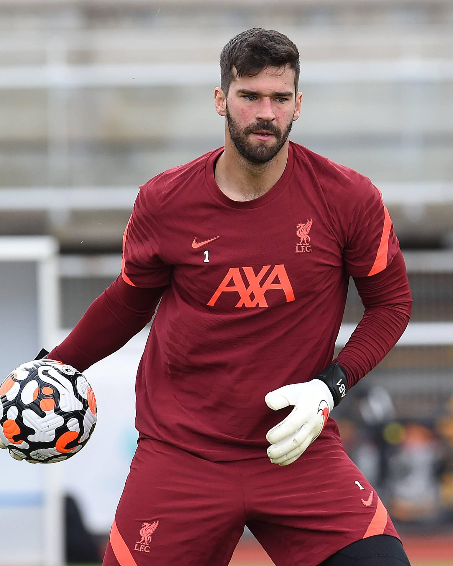 Alisson Becker Holding Ball