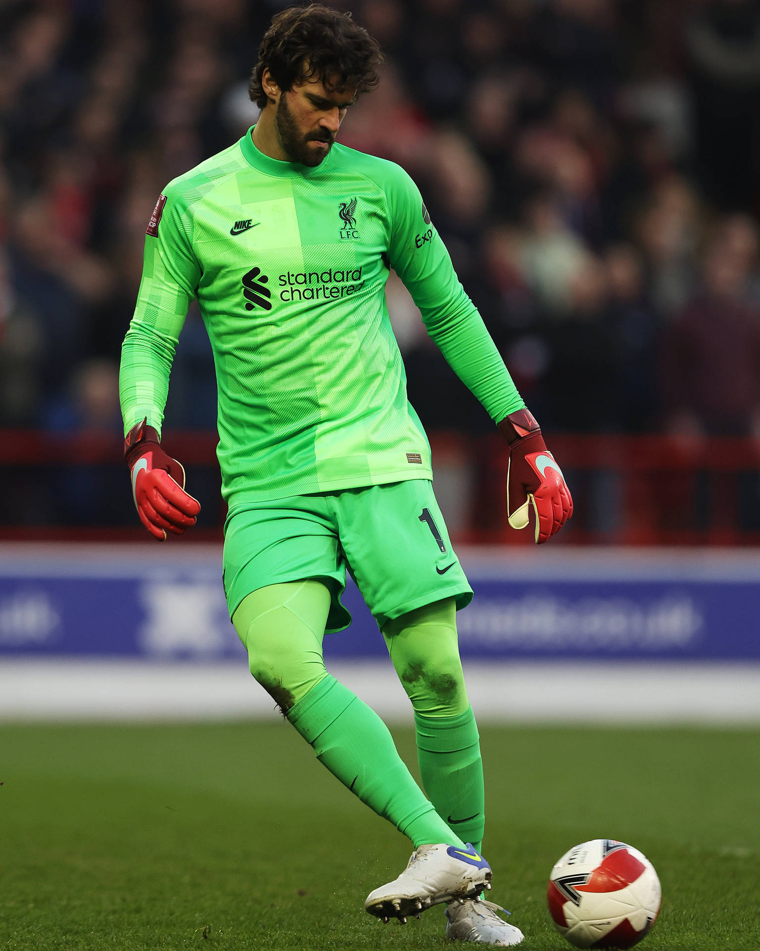 Alisson Becker Kicking Ball