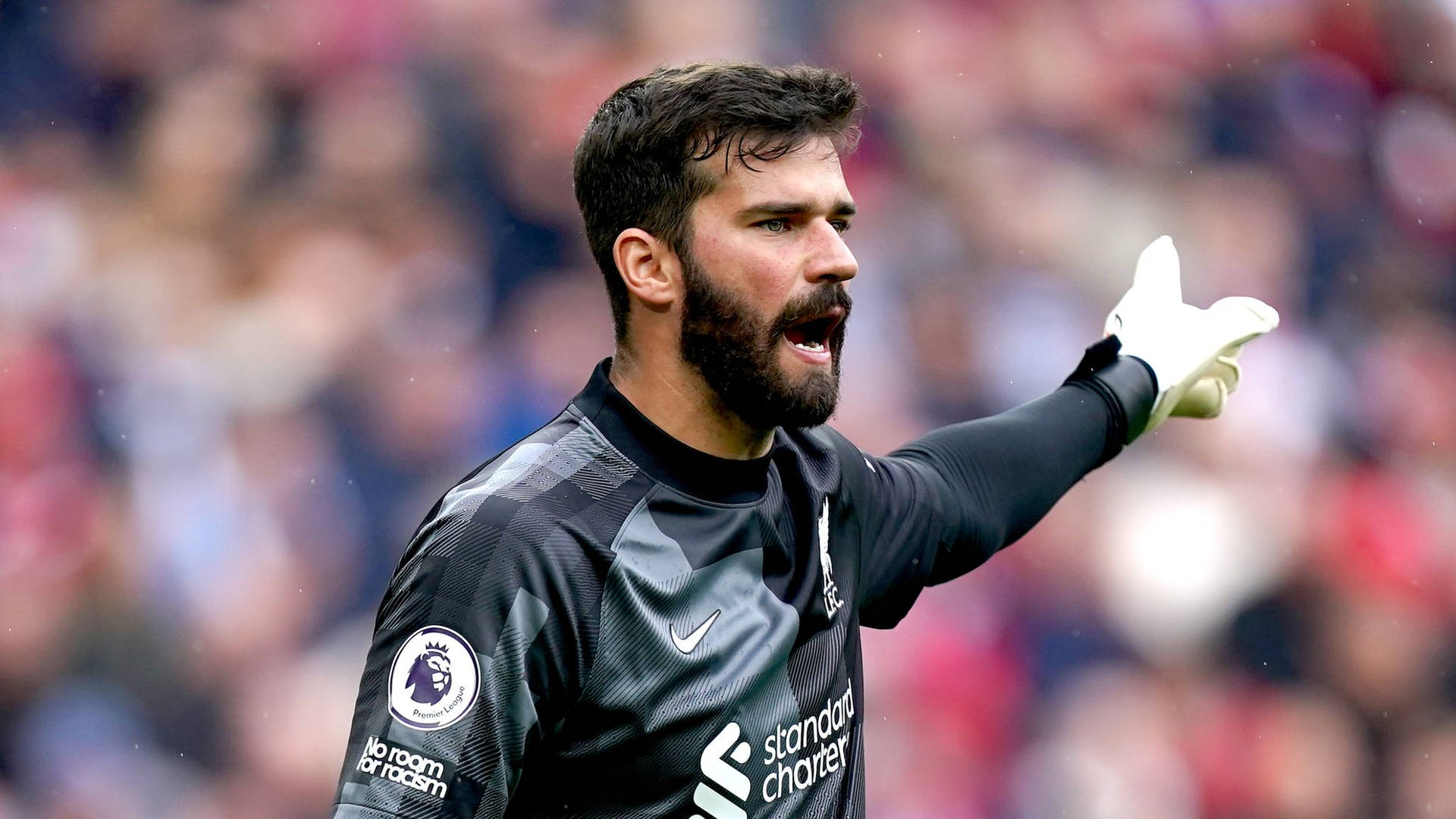 Alisson Becker Pointing Away Background