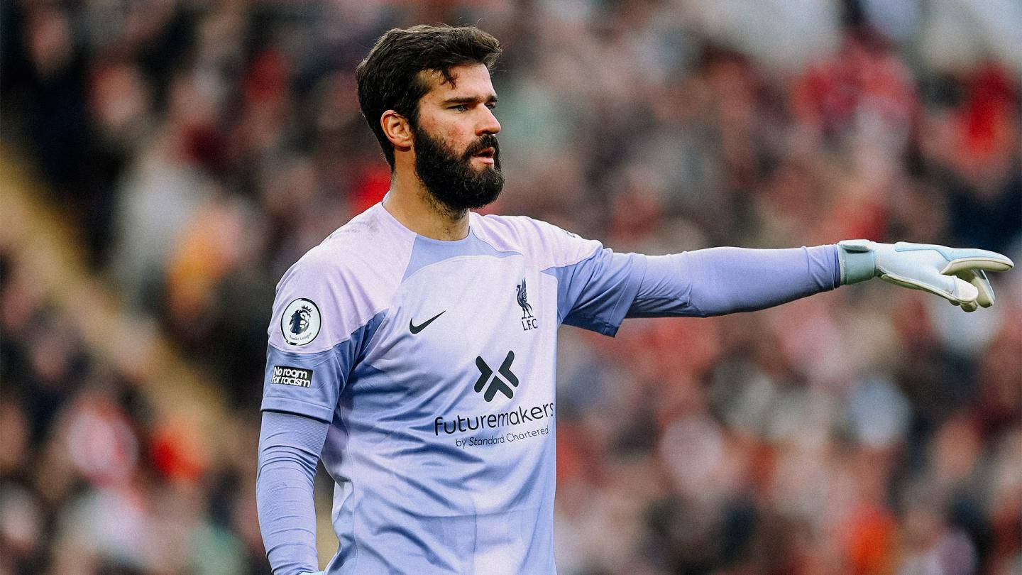 Alisson Becker Pointing To The Side