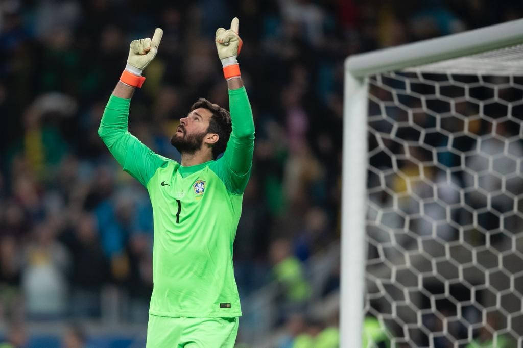 Alisson Becker Pointing Up