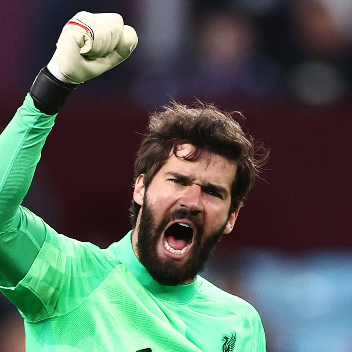 Alisson Becker Shouting With Fist Up Background