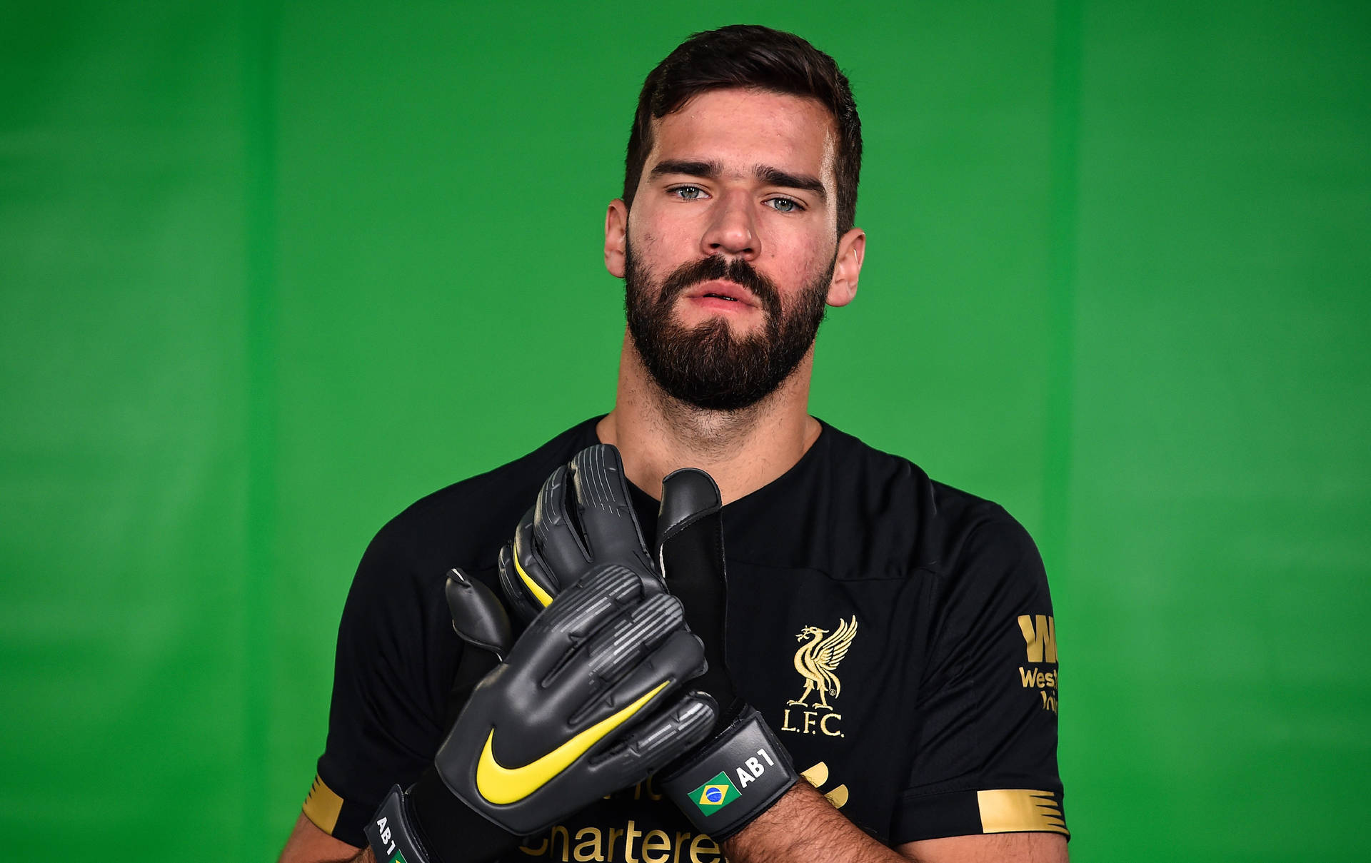 Alisson Becker With Black Gloves Background