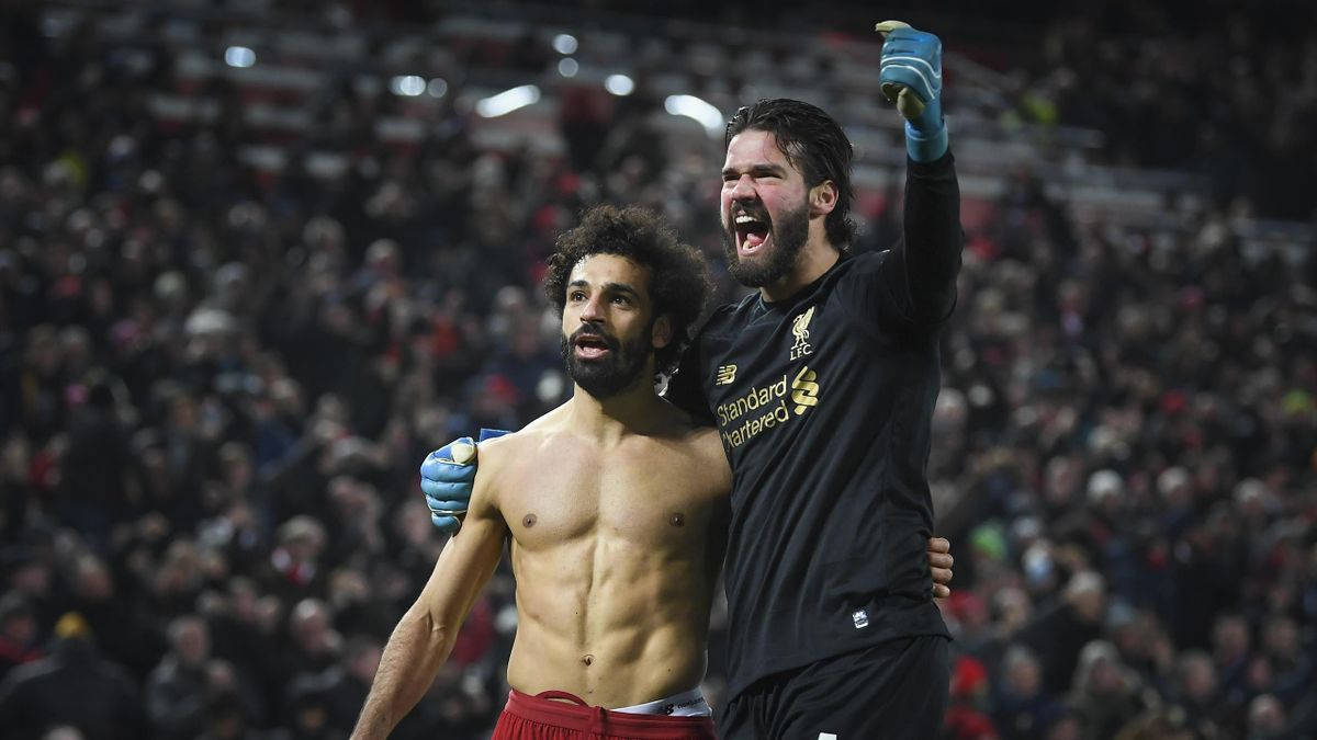 Alisson Becker With Mohamed Salah Background