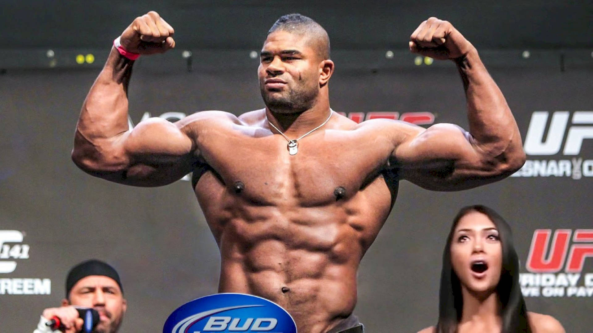 Alistair Overeem, Showing Off His Biceps With A Powerful Flex. Background