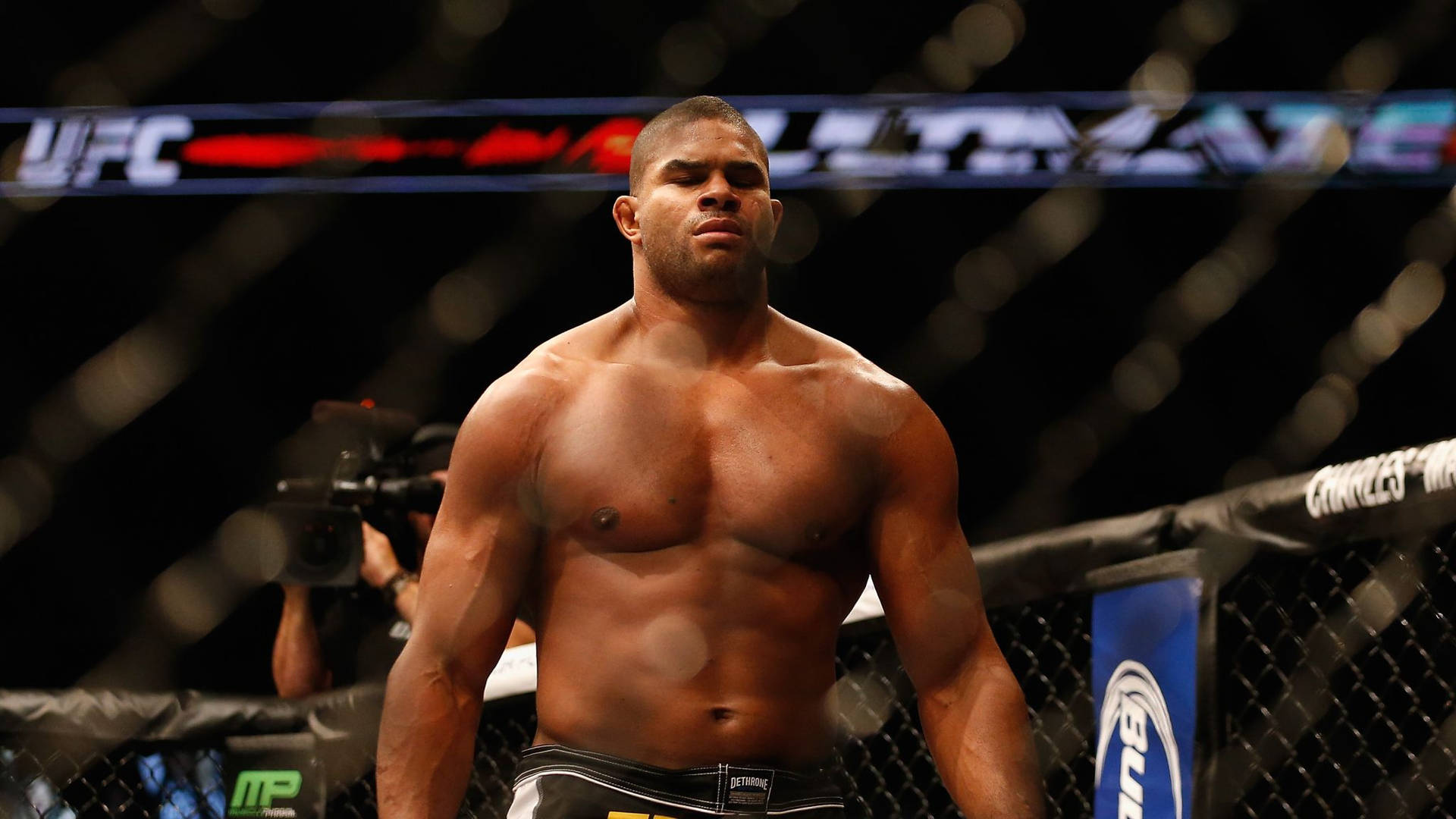 Alistair Overeem Standing In The Octagon Background