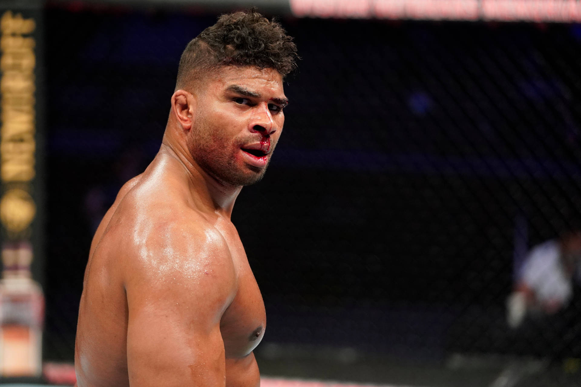 Alistair Overeem With A Nosebleed Background