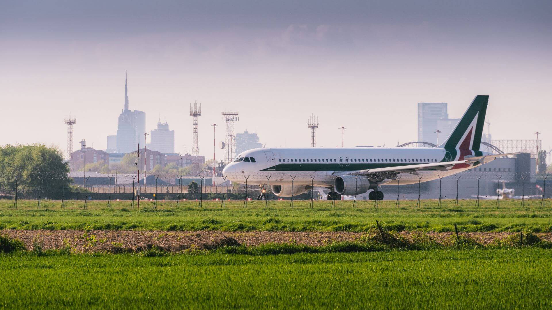 Alitalia Grass Field Background