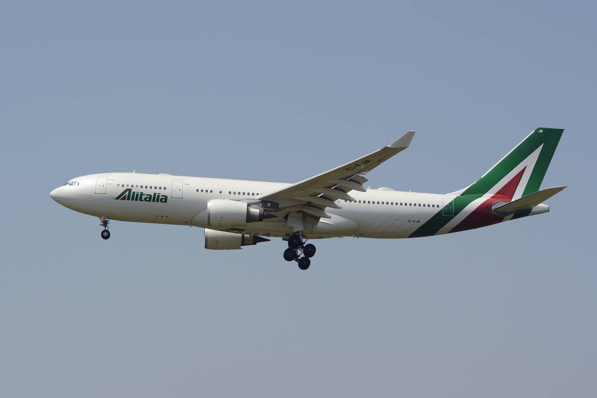 Alitalia Green On Vertical Stabilizer Background