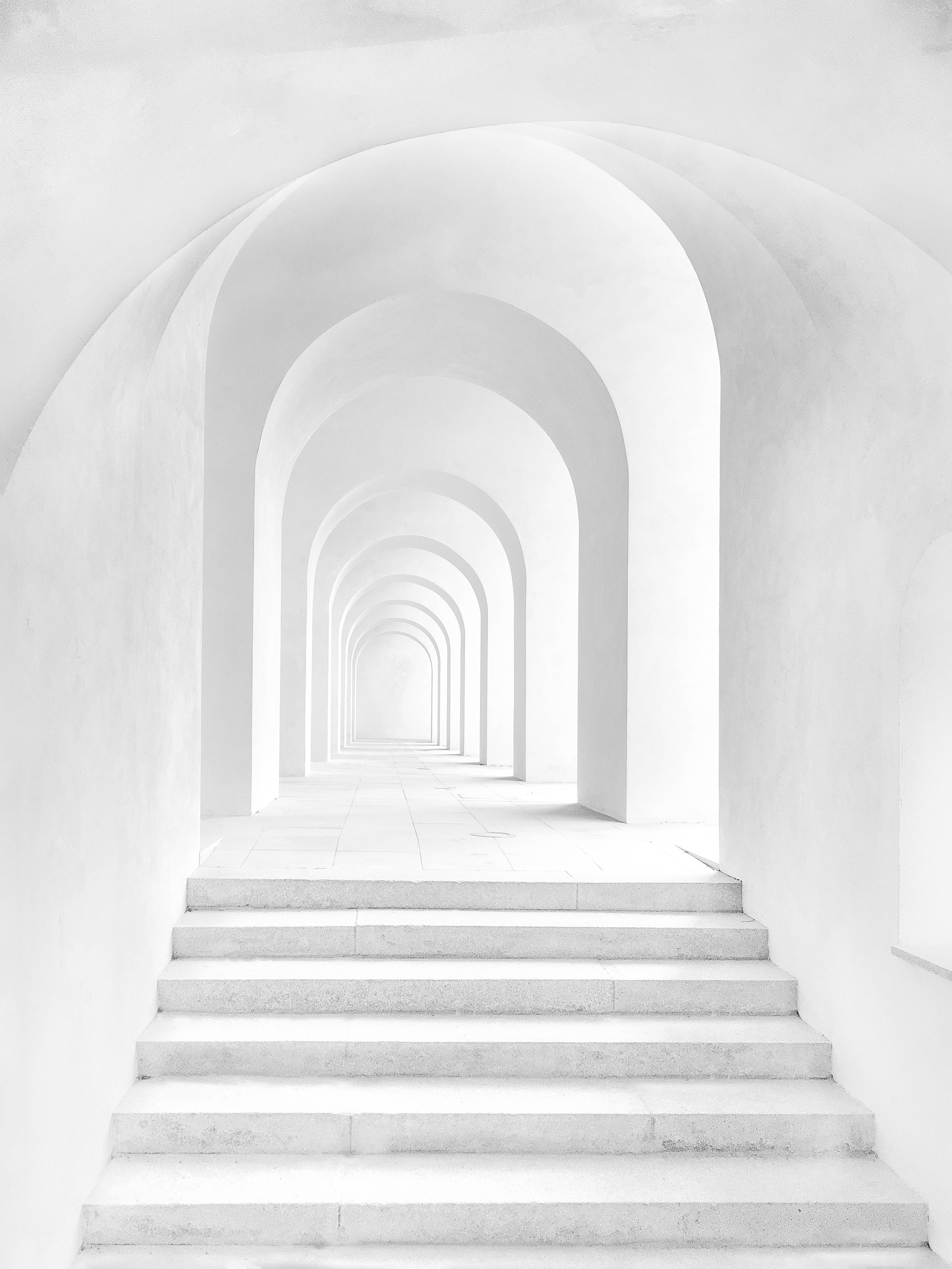 All White Hallway With Stairs Background