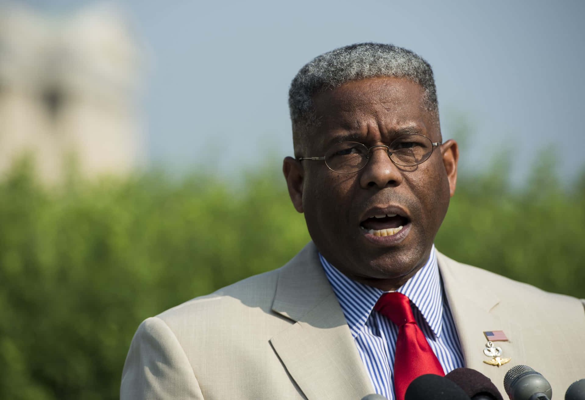 Allen West In Open Field Background