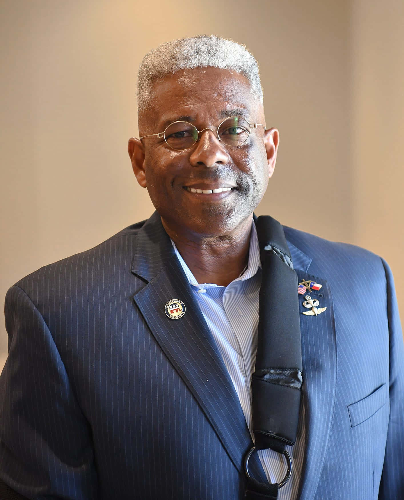 Allen West With Military Badge Background