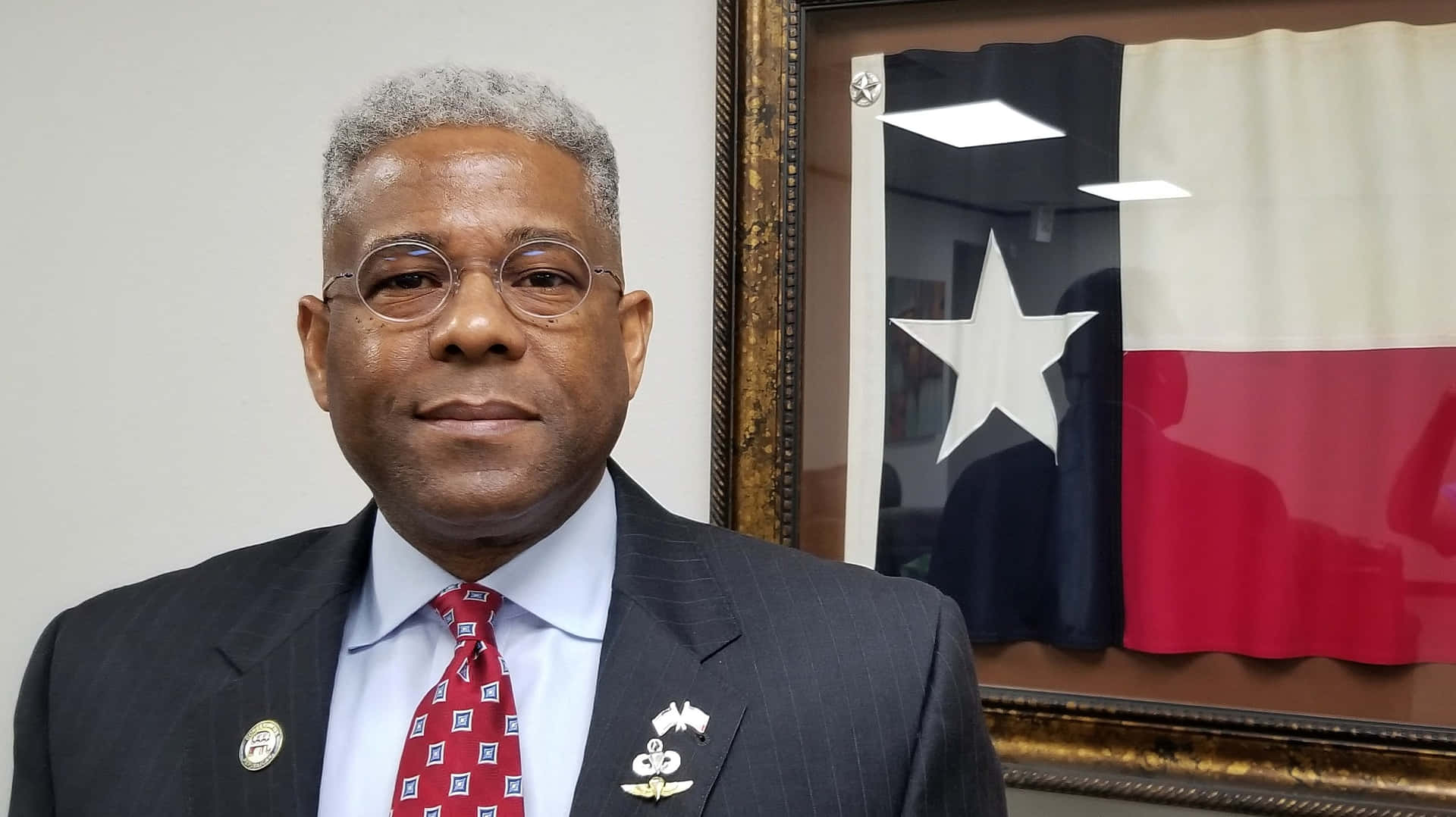 Allen West With The Texas State Flag Background