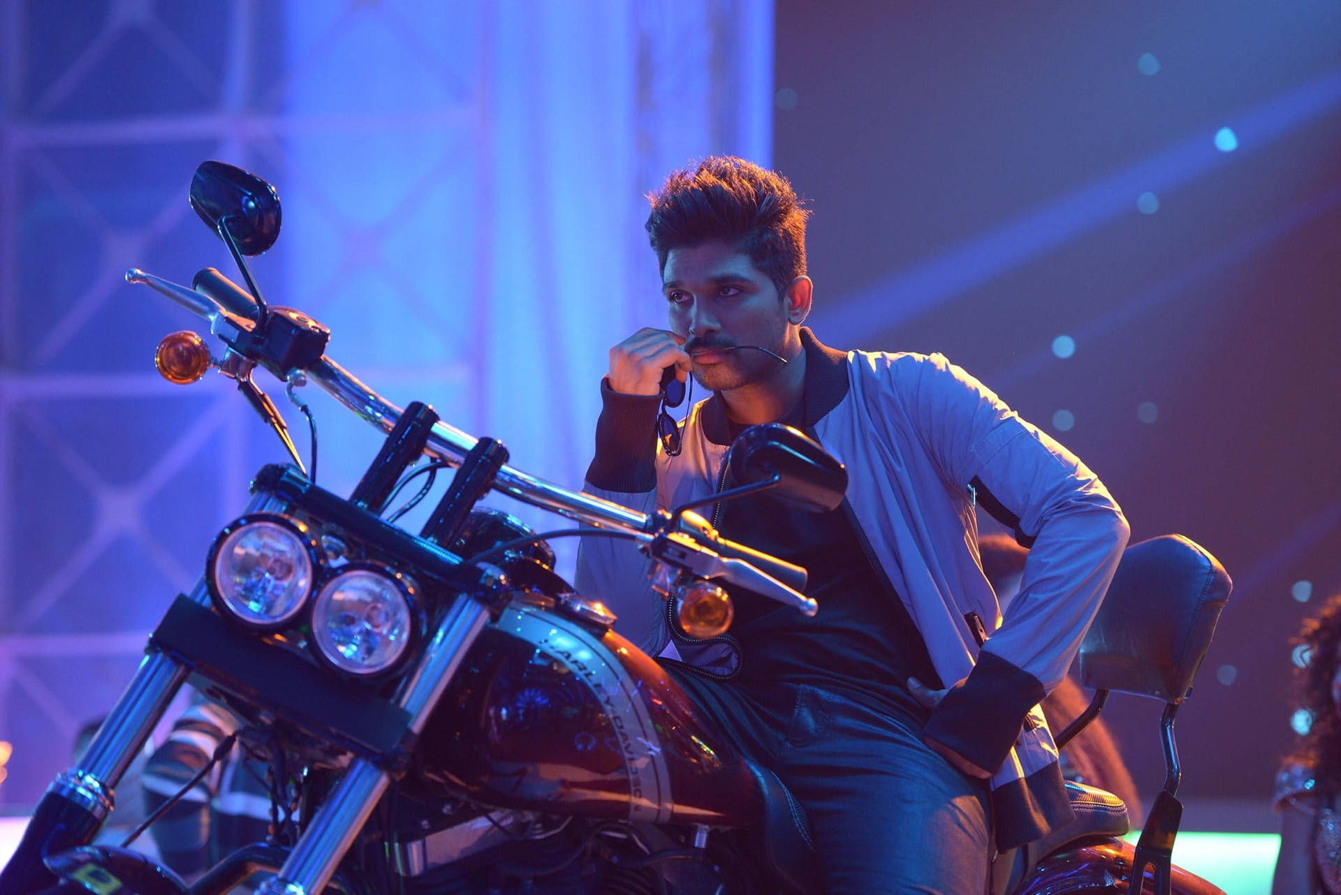 Allu Arjun Hd Motorcycle On Stage Background