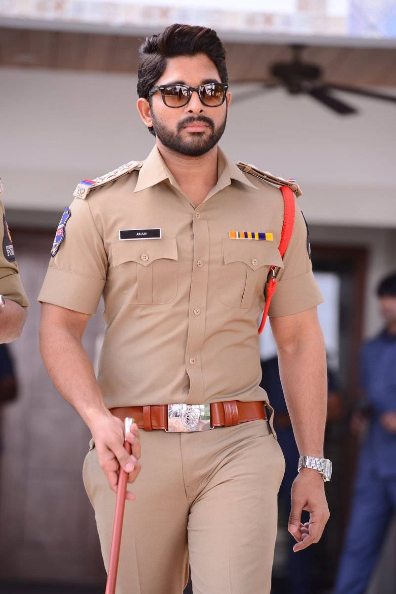 Allu Arjun In Police Uniform Holding Cane