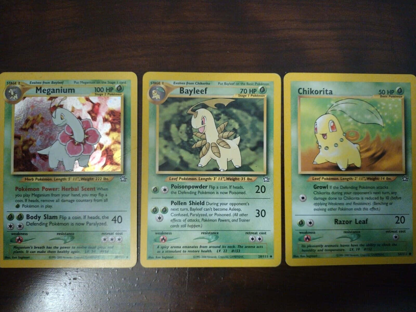Alluring Meganium Portraying Evolution In Pokemon Trading Cards Background