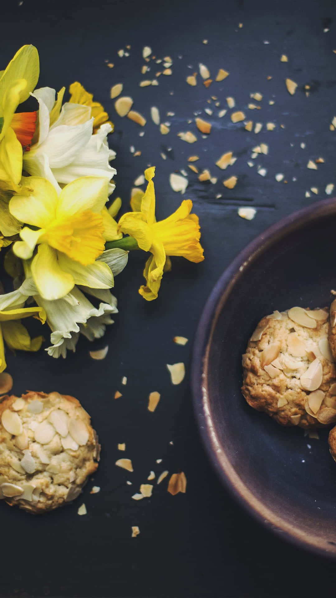 Almond Cookies With Daffodils On A Plate