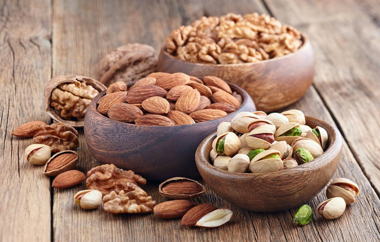 Almonds Walnuts And Pistachio Nuts Background