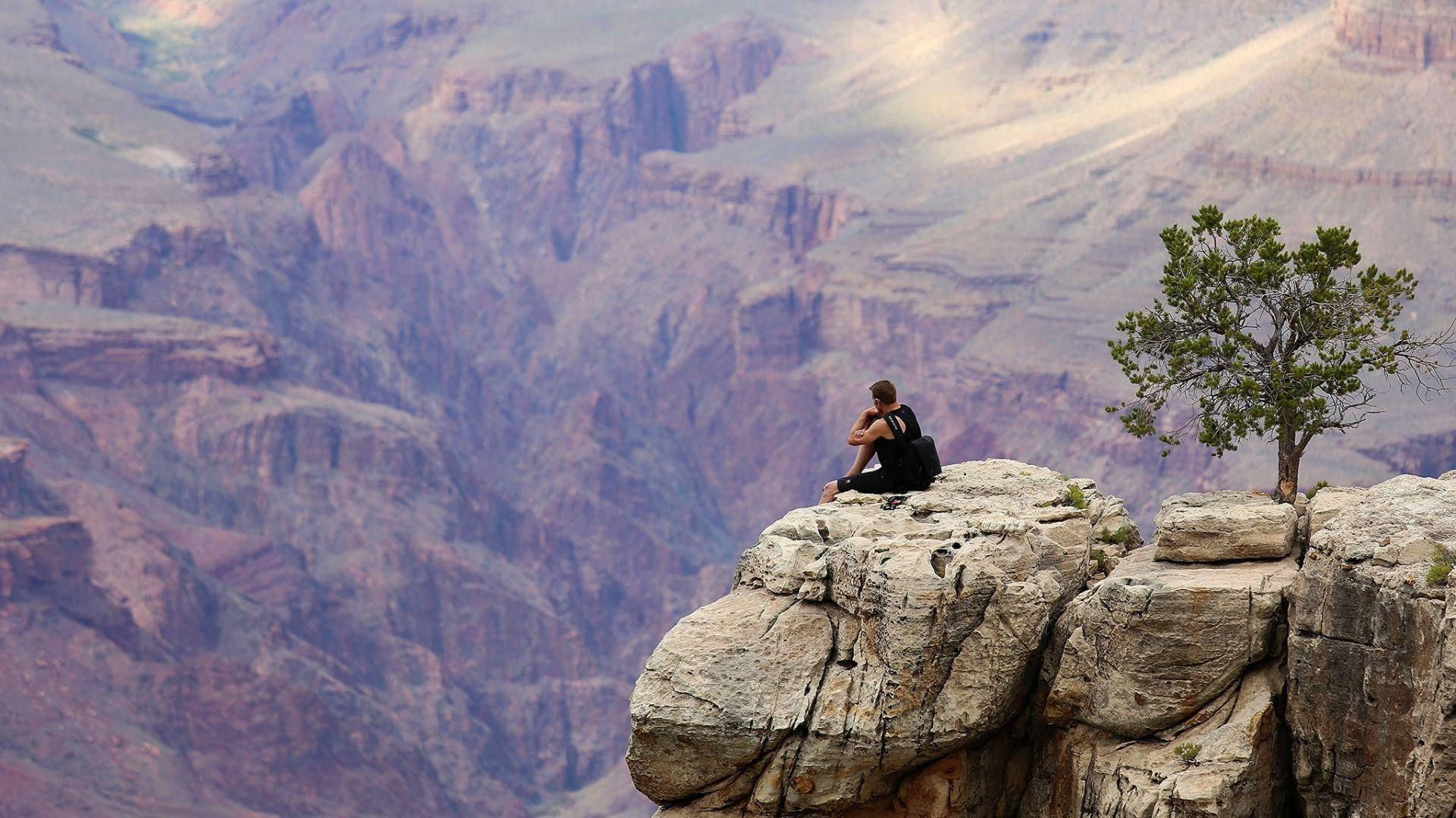 Alone Boy On A Cliff Background