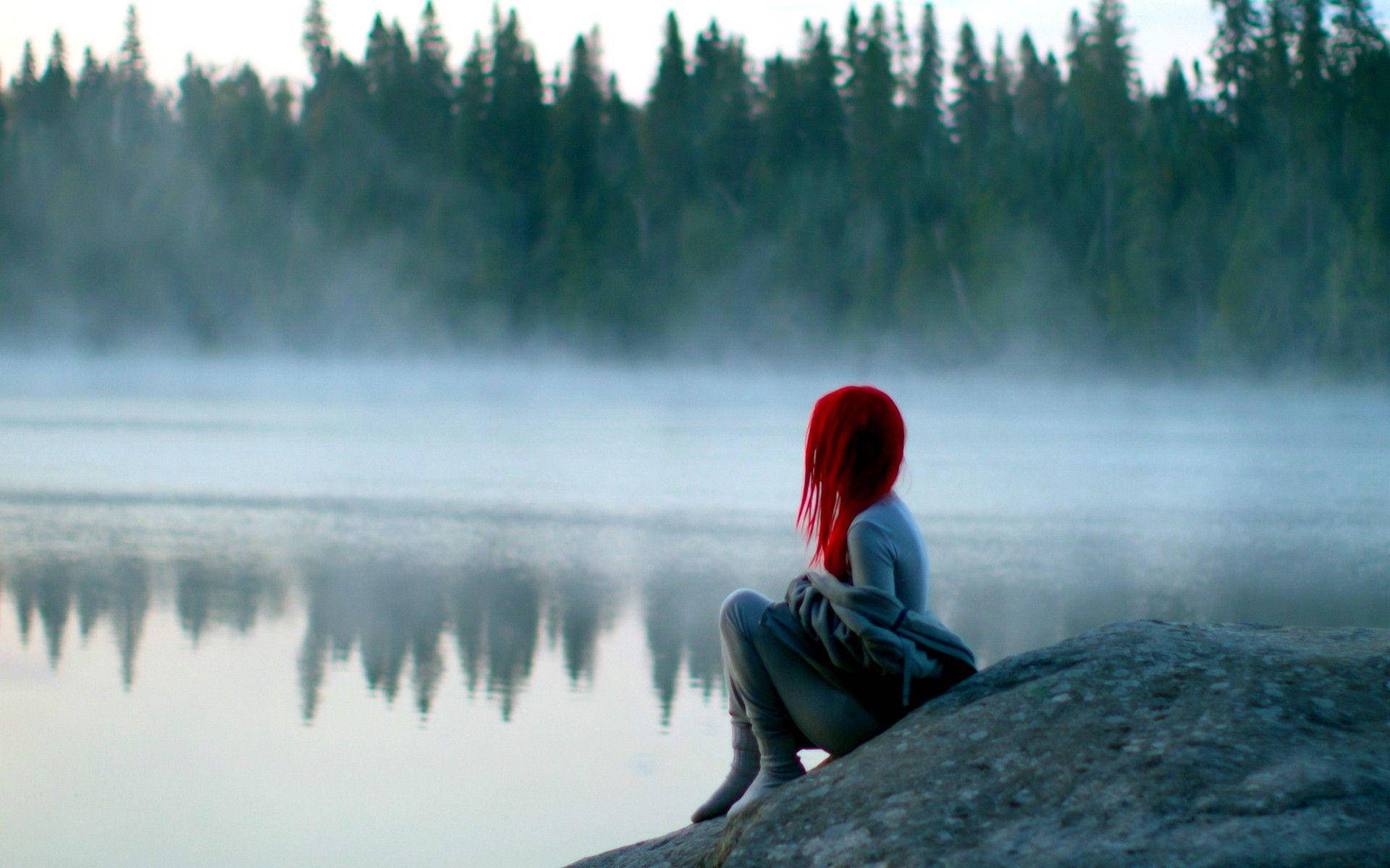 Alone Woman Beside Lake