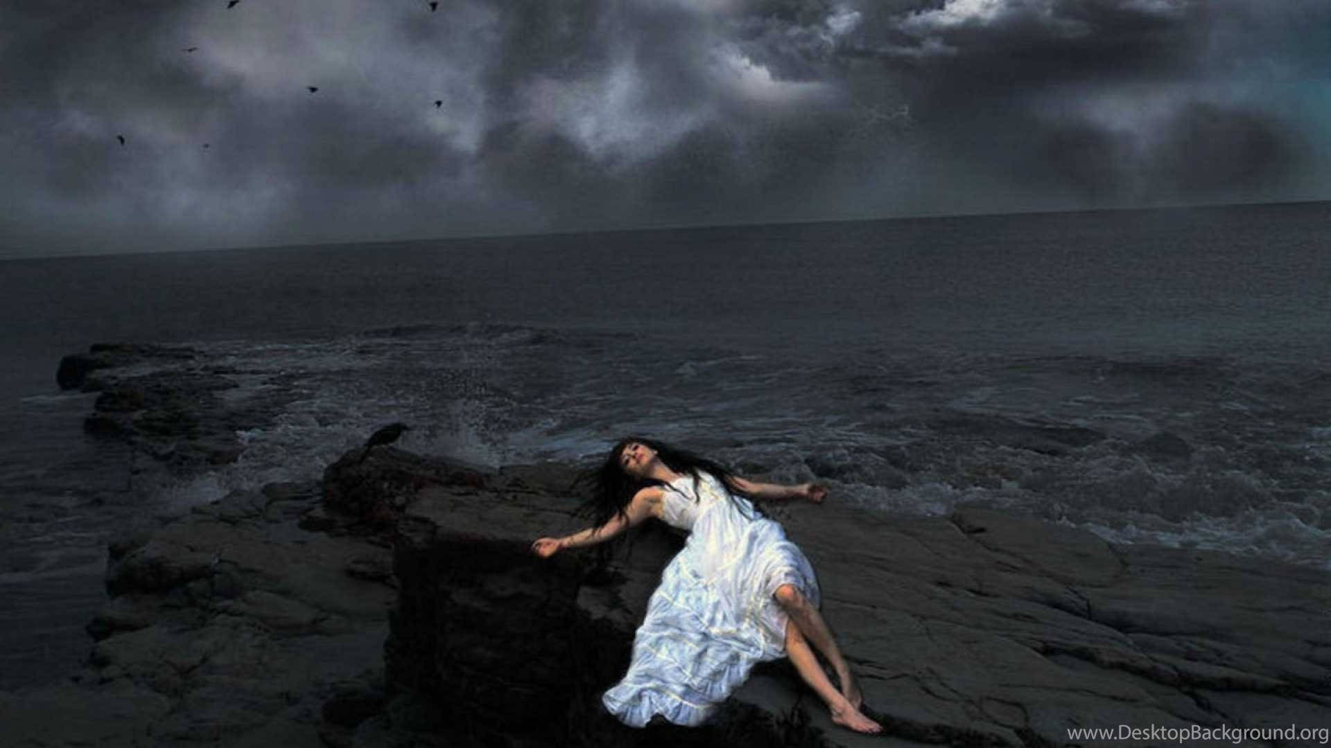 Alone Woman Lying Beside Ocean