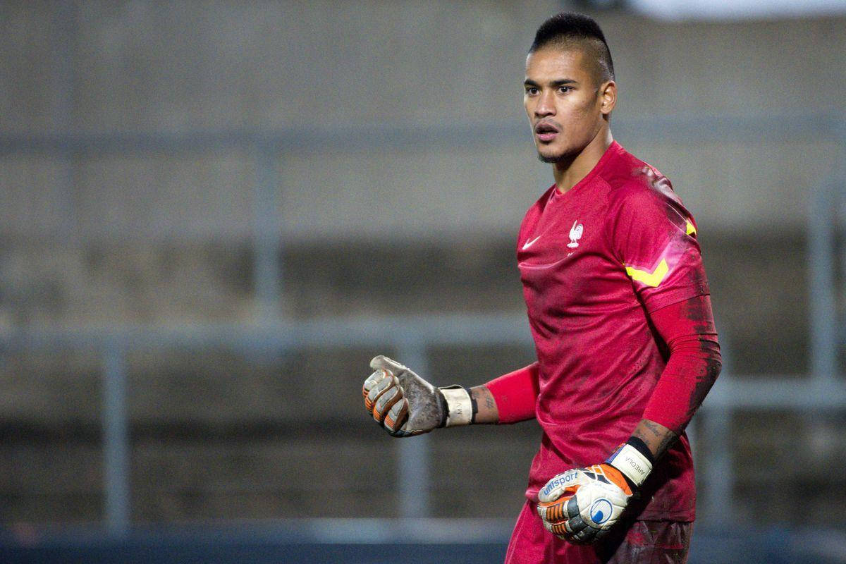 Alphonse Areola In Red Uniform Background