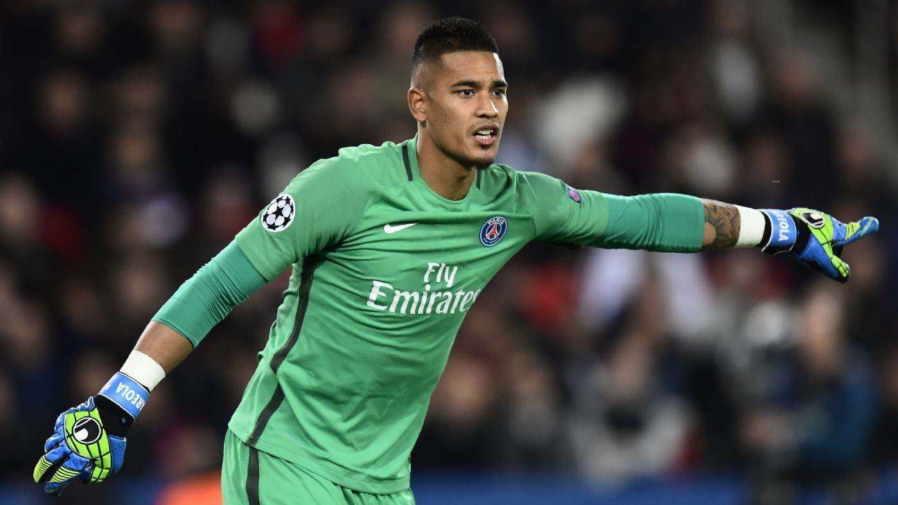 Alphonse Areola Pointing To His Left Background