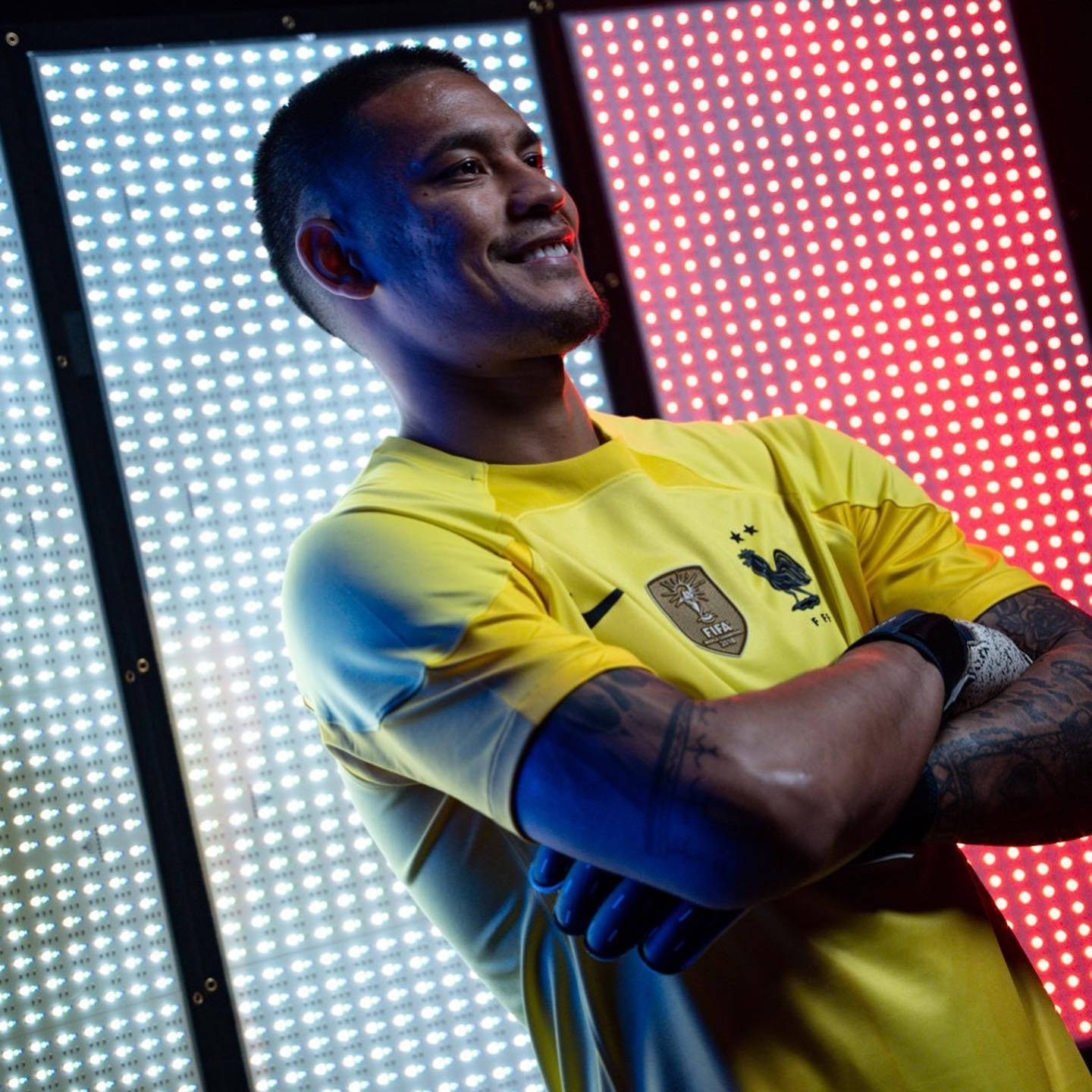 Alphonse Areola With Arms Crossed Background