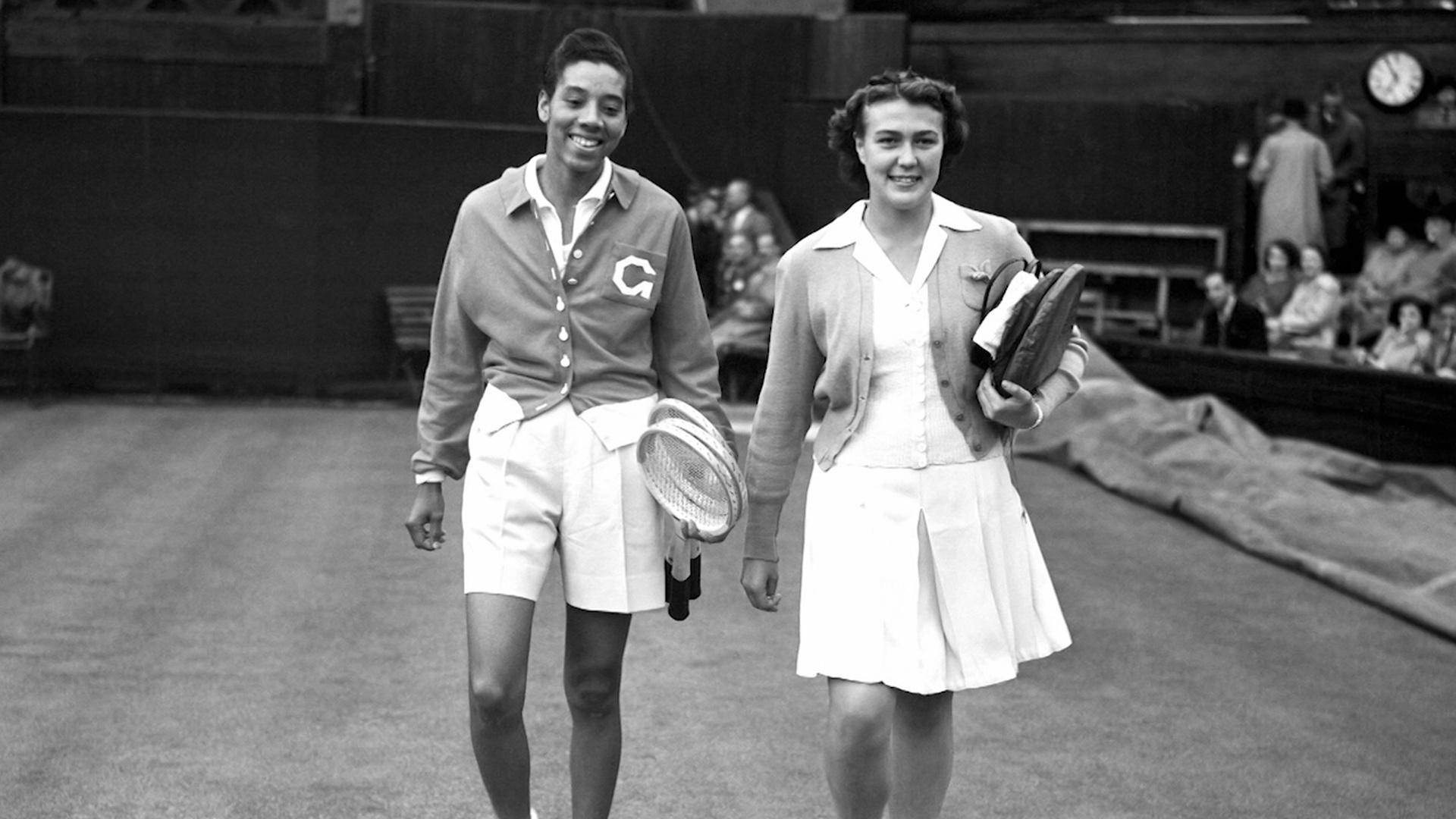 Althea Gibson And Angela Buxton Celebrating Tennis Victory Background