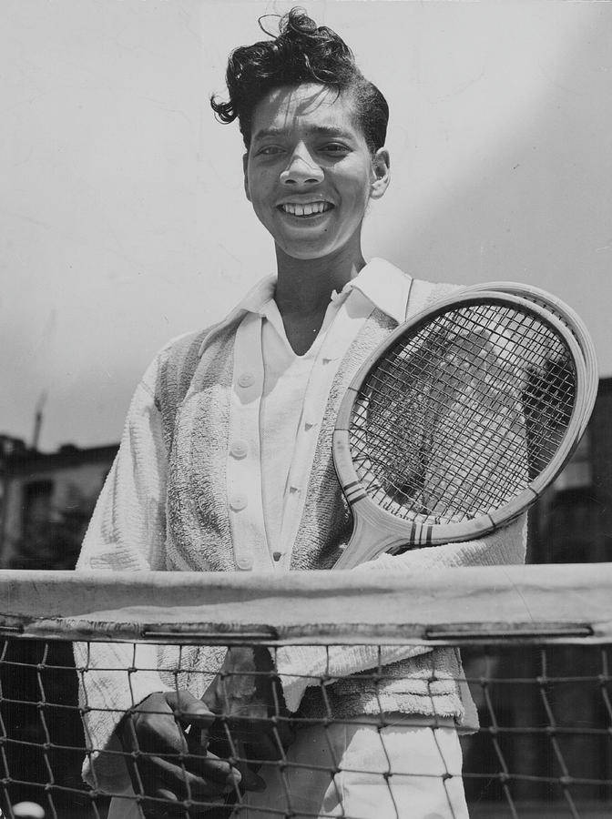 Althea Gibson In Tennis Court Background