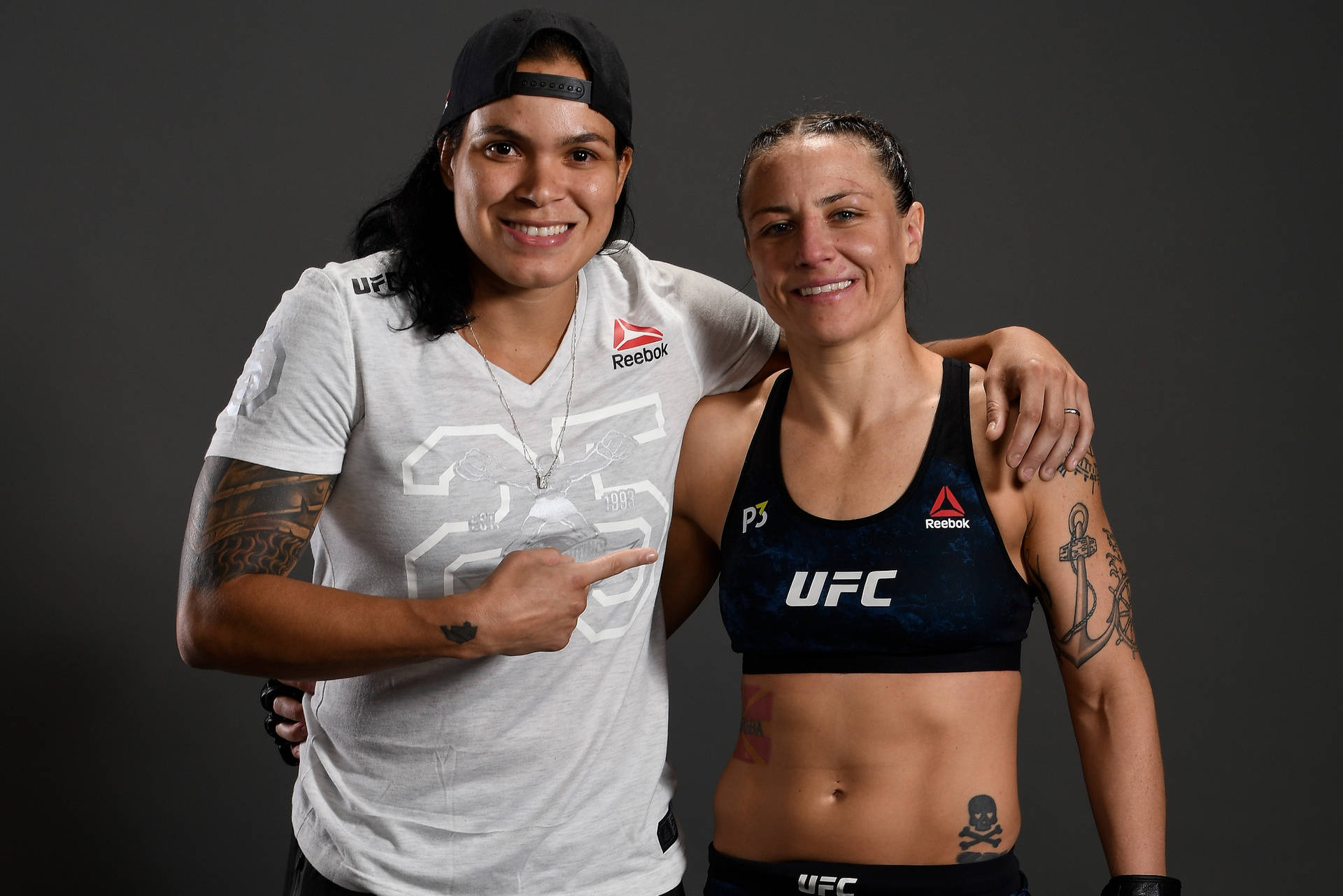 Amanda Nunes And Nina Ansaroff Background