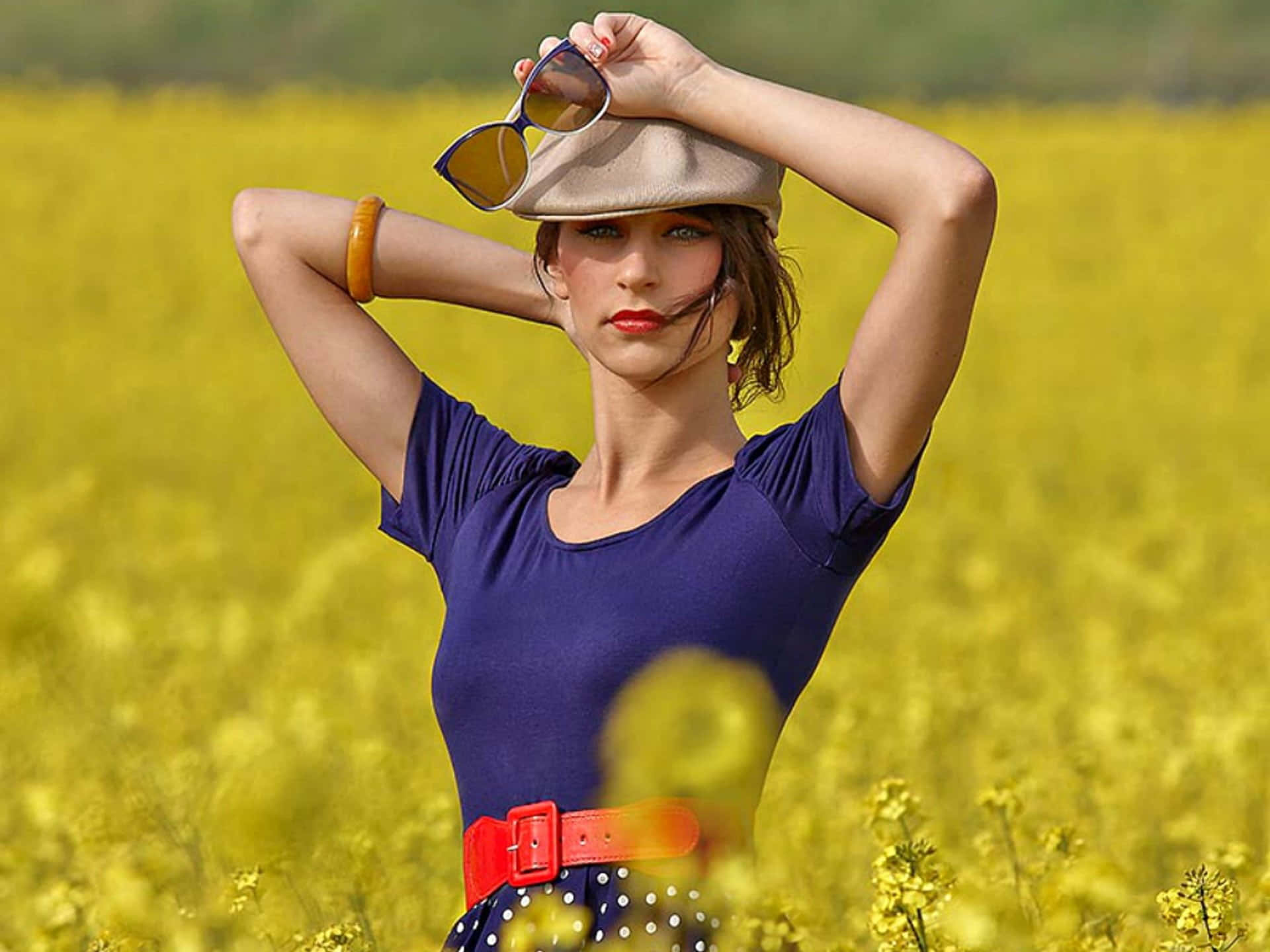 Amateur Model In Yellow Flower Field Background