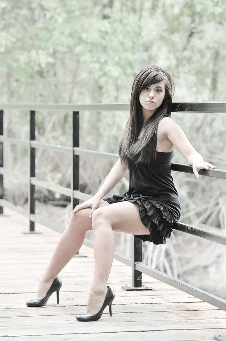 Amateur Model On Bridge Railing Background