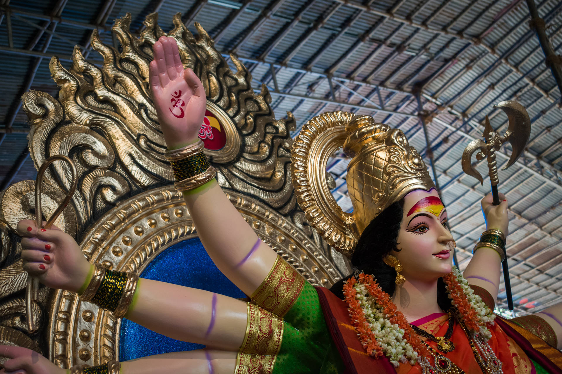 Ambe Maa Statue In Gold Background