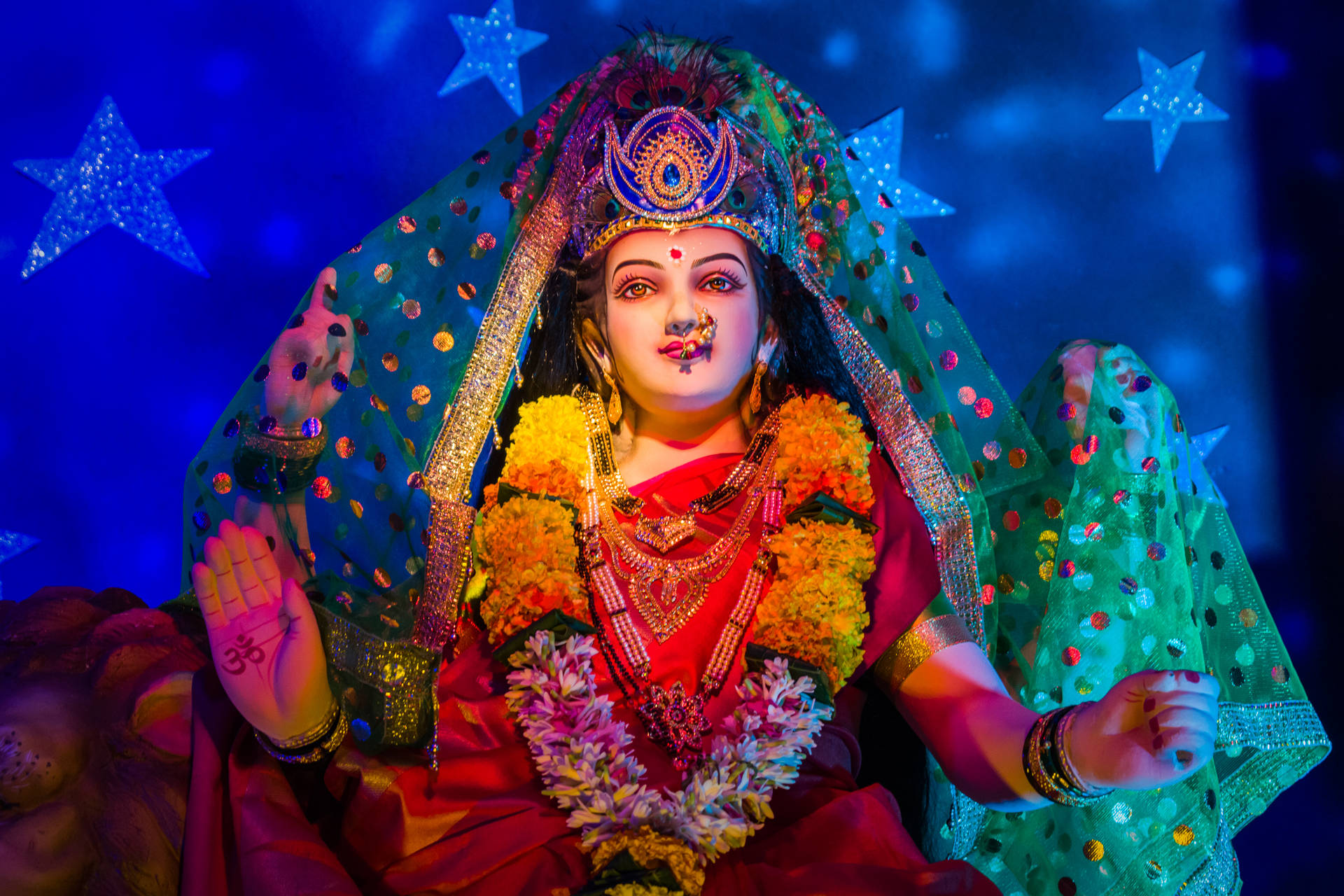 Ambe Maa With Floral Garland Background