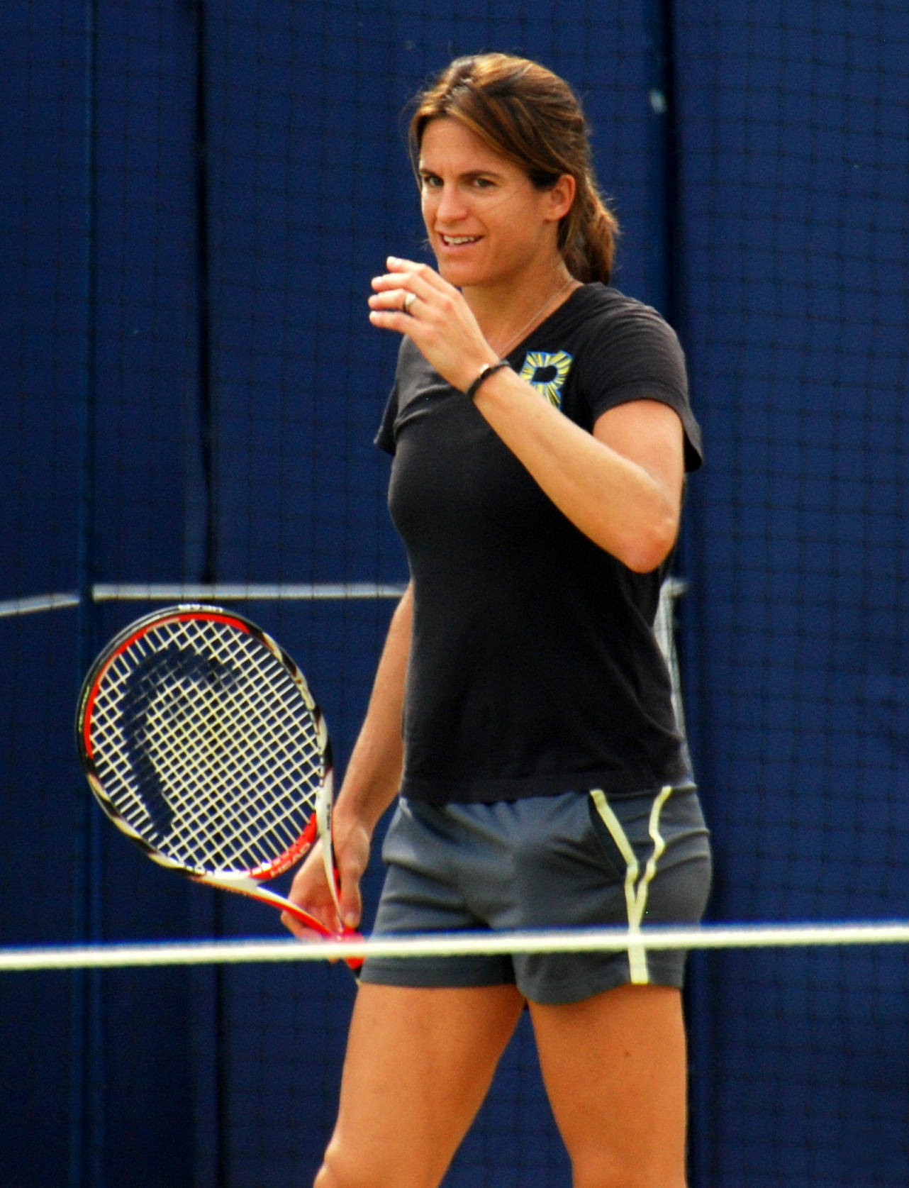 Amélie Mauresmo Resting During Training Background