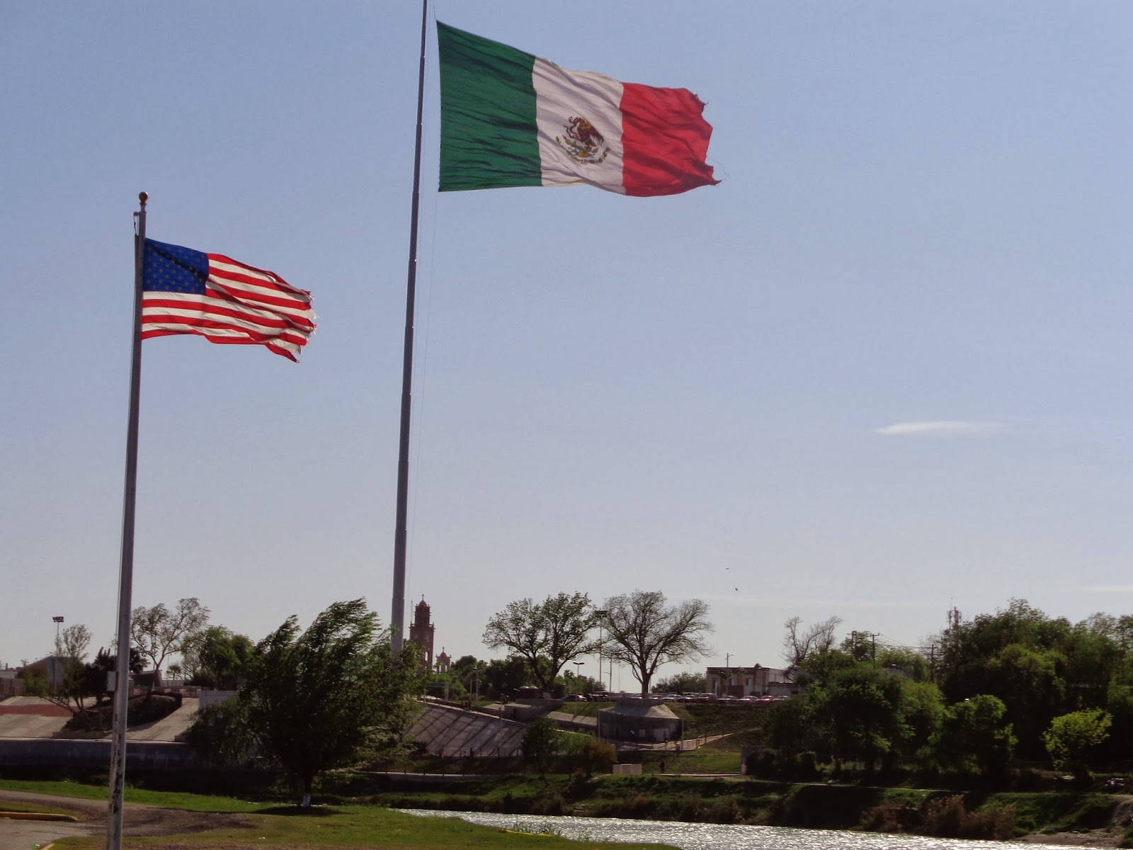 America And Mexico Flag Waving Background