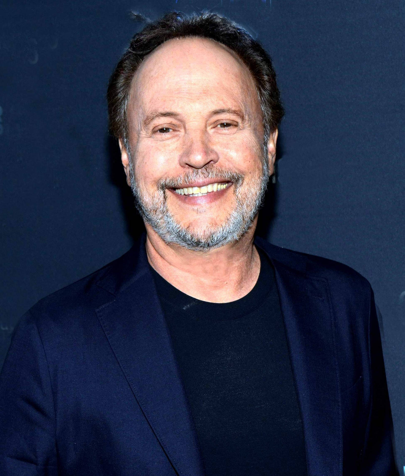 American Actor Billy Crystal Dark Blue Suit Background