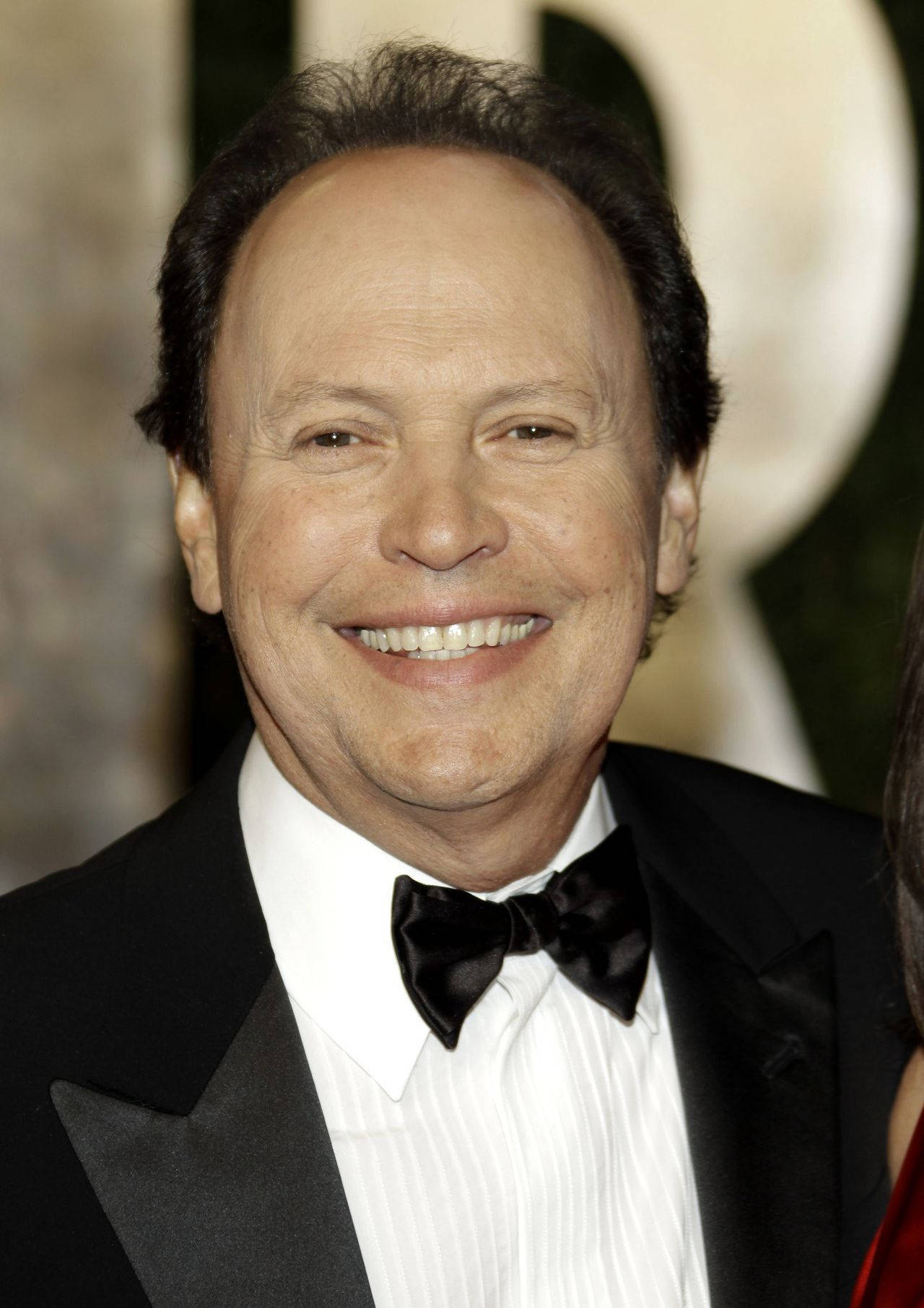 American Actor Billy Crystal Elegant Suit Background