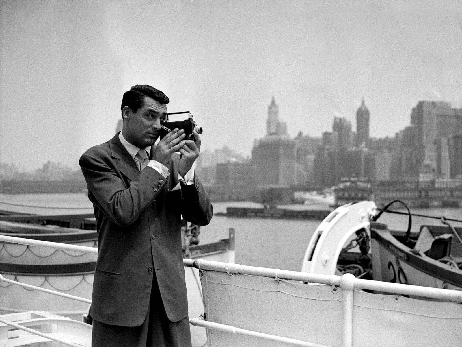 American Actor Cary Grant With A Camera