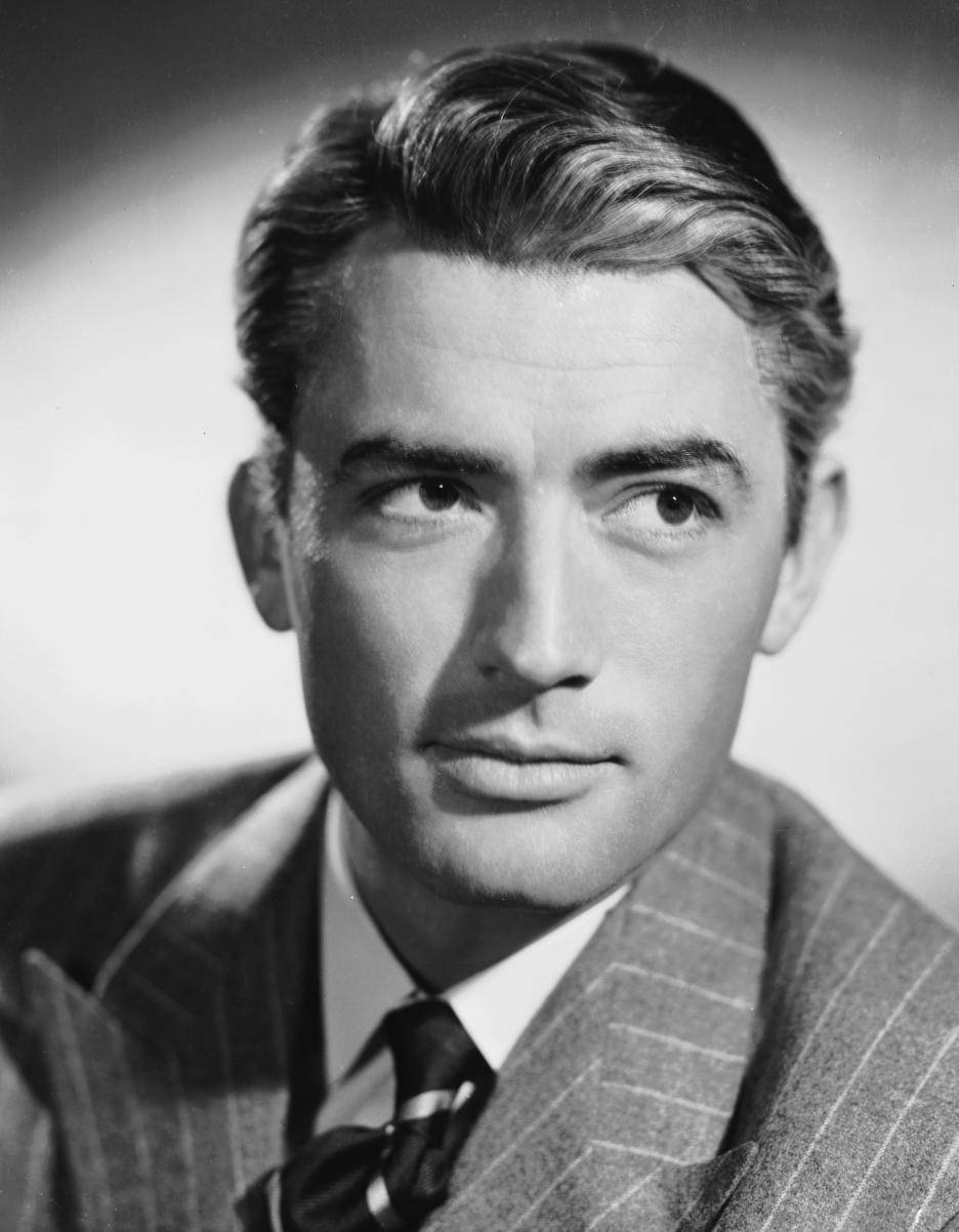 American Actor Gregory Peck In Tuxedo Background