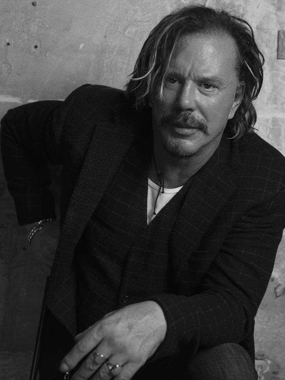 American Actor Mickey Rourke In Black And White Background