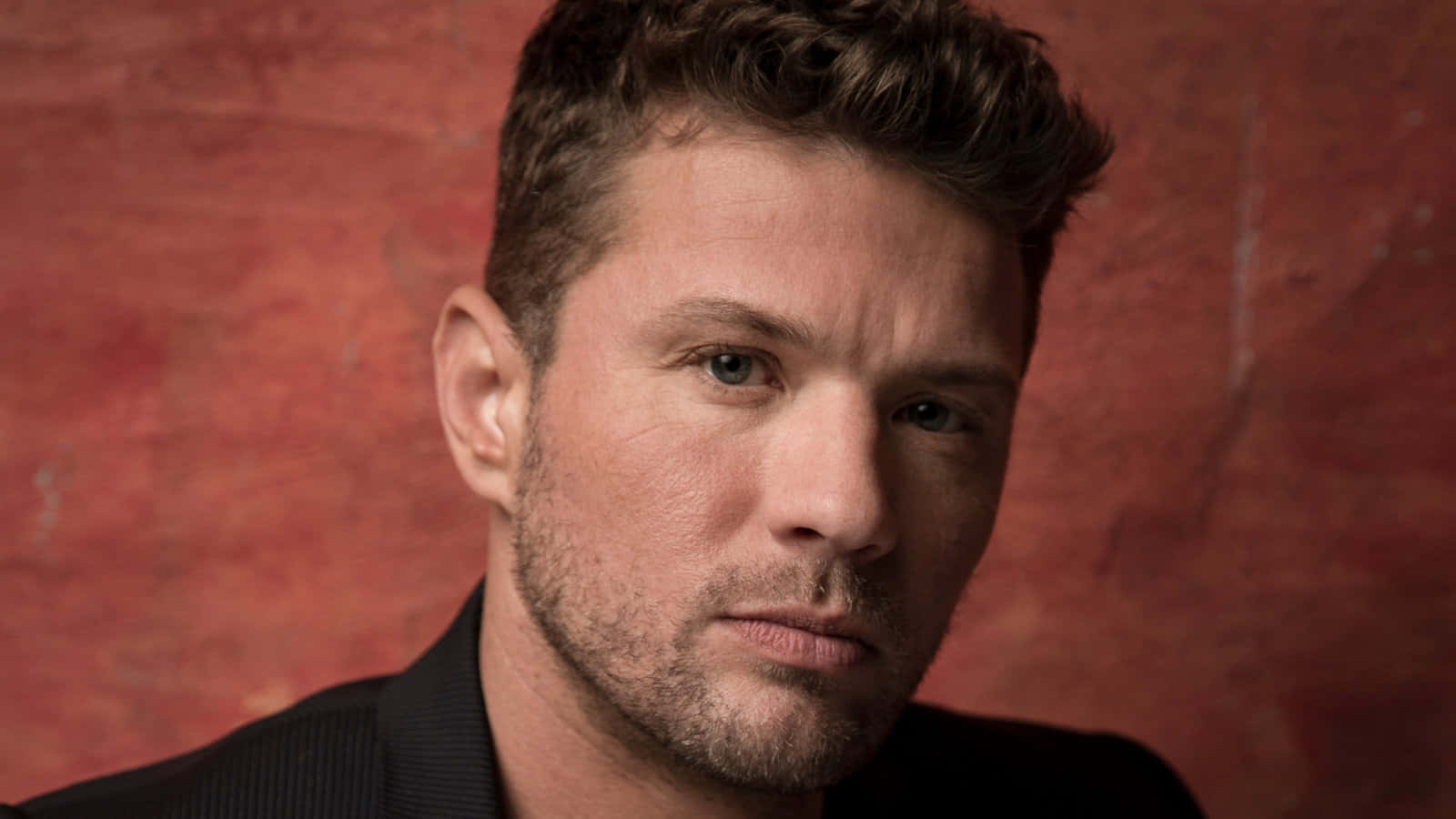 'american Actor Ryan Phillippe Exuding Charisma' Background